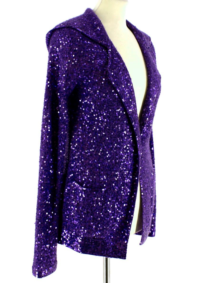 Donna Karan Purple Sequin Hooded Cardigan 

- Sequin embellishment 
- Front popper fastening
- Two front slip pockets 
- Long sleeved
- Hooded

Materials:
- 70% Cashmere
- 30% Silk

Hand Washable 

Made in China 
Measurements are taken laying flat,