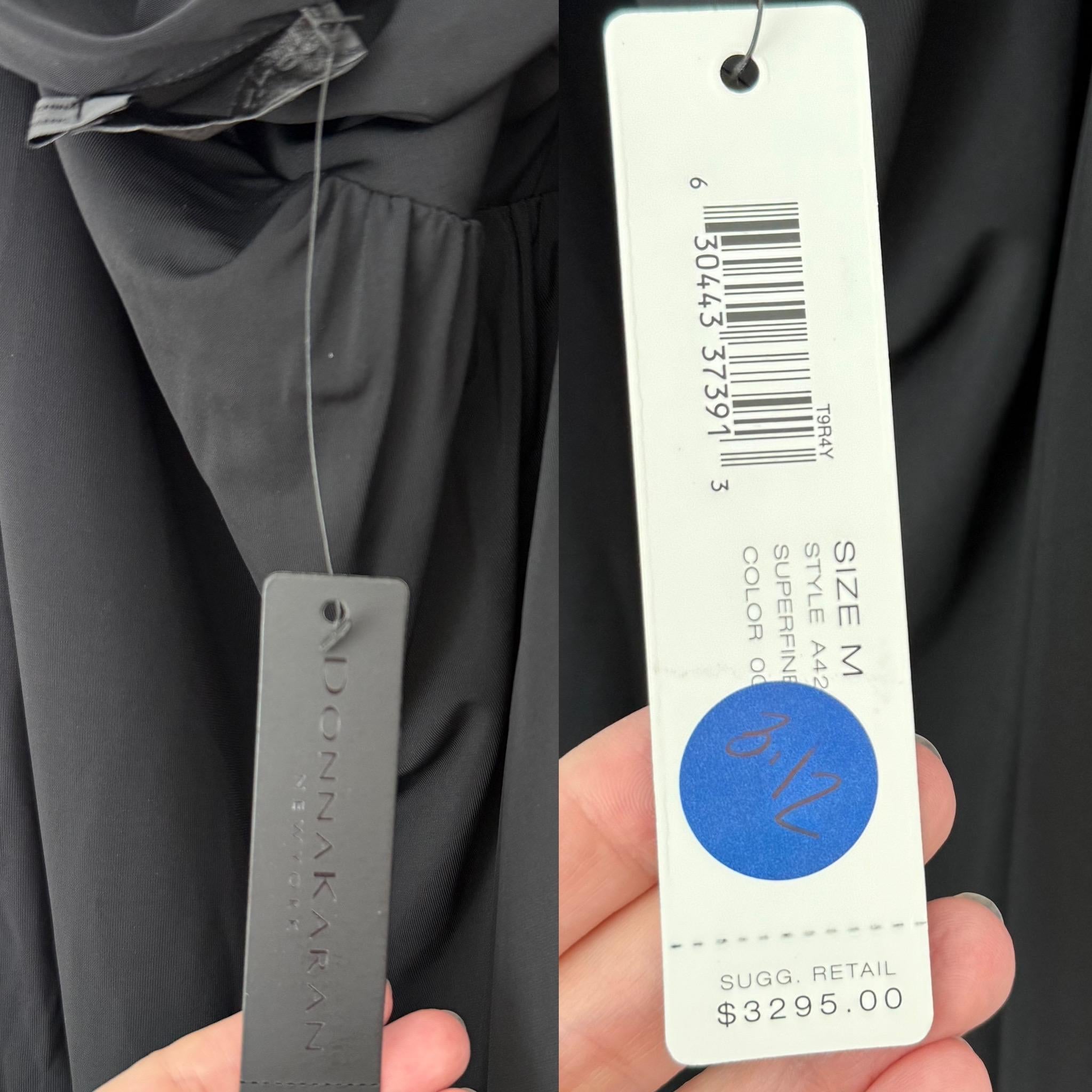 Donna Karan
Jet black
Long sleeved
Ruched
Extremely flattering cut
Cut out at front
Pullover
Stretchy
Size Medium
NWT's, Pristine
Retailed for $3,295
Measurements in inches laying flat: length 57, pit to pit up to 18, smallest of waist up to 17,