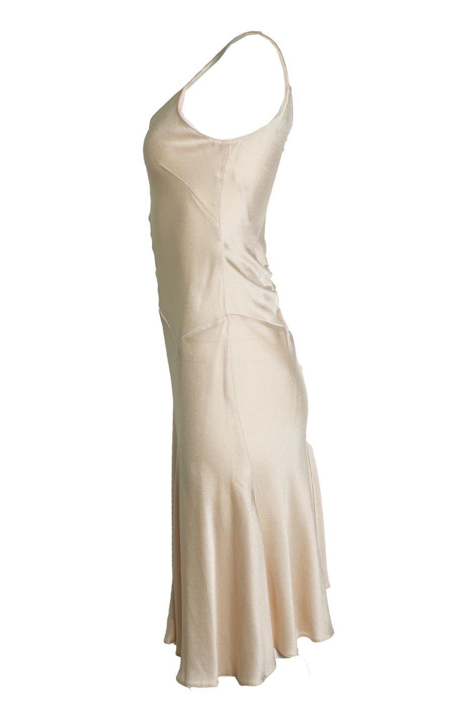 Donna Karan Signature, silk midi slip dress in ecru. The item is in very good condition. 

CONDITION: very good condition

SIZE: US4 - UK10 - FR38

MEASUREMENTS: length 112 cm, bust 38 cm, waist 33 cm

MATERIAL: 59% rayon 41% acetate

CARE: dry