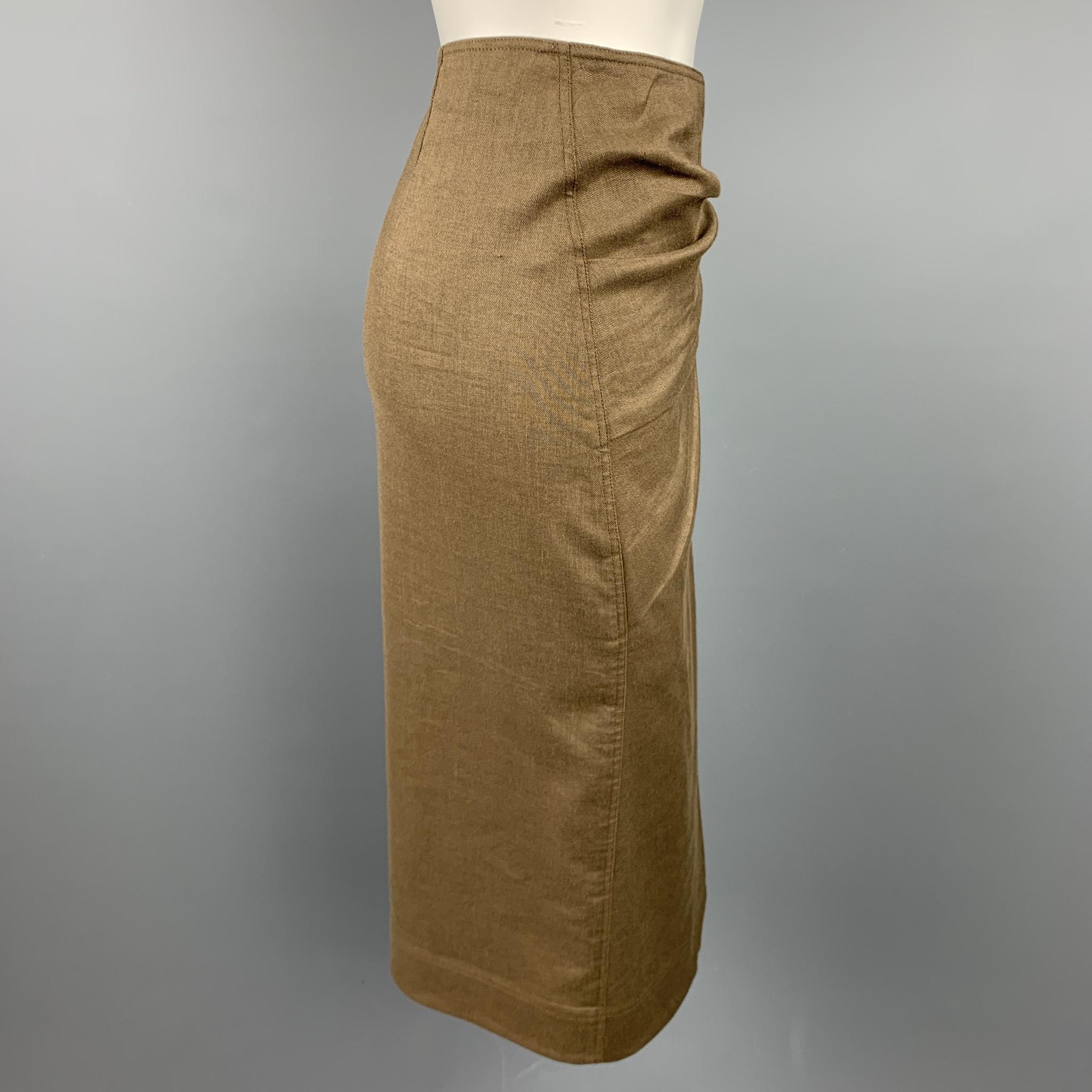 DONNA KARAN skirt comes in a olive twill wool / linen featuring a draped style, side slit, and a side tab closure. Blazer set sold separately.

Very Good Pre-Owned Condition.
Marked: 4

Measurements:

Waist: 29 in. 
Hip: 32 in. 
Length: 28 in. 