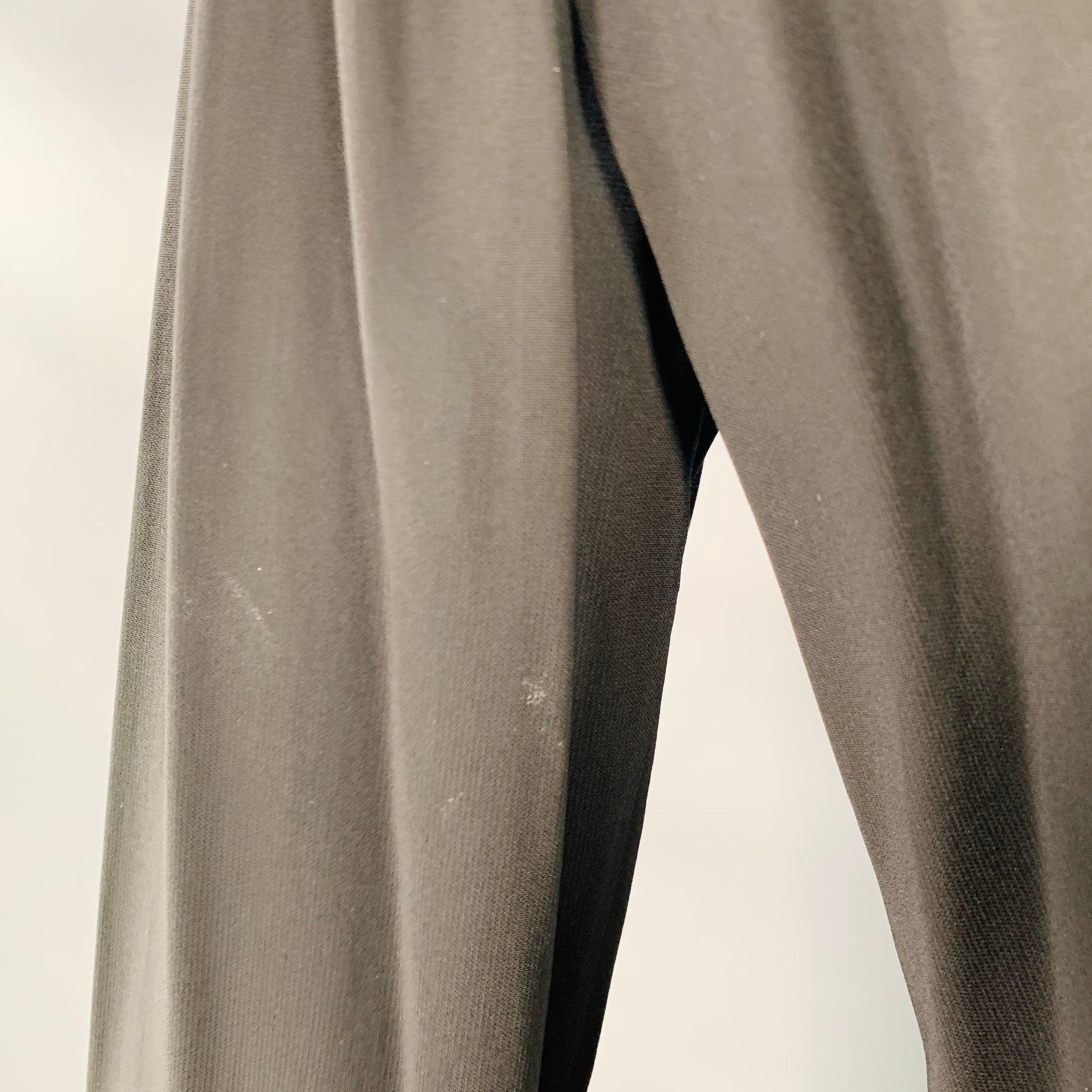 Donna Karan Taglia 8 Camicetta nera crema in misto viscosa con bottoni nascosti in vendita 1