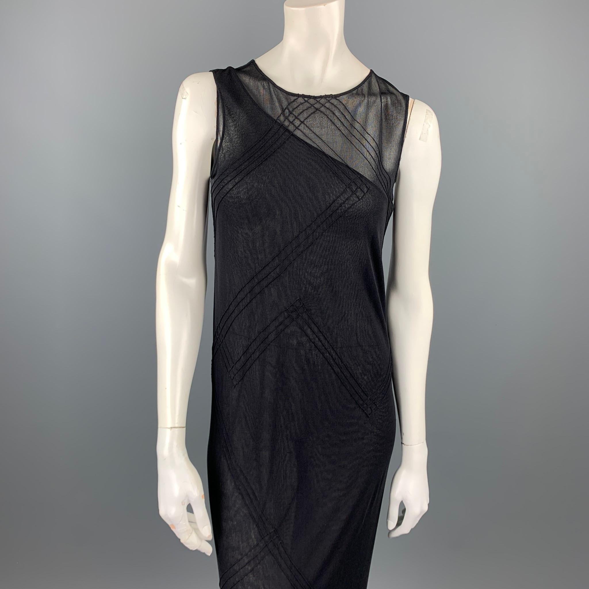 DONNA KARAN dress comes in a black mesh polyester / rayon with a one shoulder liner featuring a shift style, slip on, and top stitching. Made in USA.

Very Good Pre-Owned Condition.
Marked: L

Measurements:

Shoulder: 15 in. 
Bust: 34 in. 
Hip: 34
