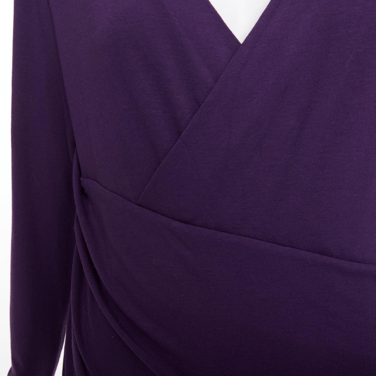 DONNA KARAN Abito con scollo a cuneo e drappeggio in jersey viola V.I.L.A.
Riferimento: JHDN/A00128
Marchio: Donna Karan
Modello: Abito a portafoglio con scollo a cespo
Materiale: Viscosa, misto
Colore: viola
Modello: Tinta unita
Chiusura: Slip