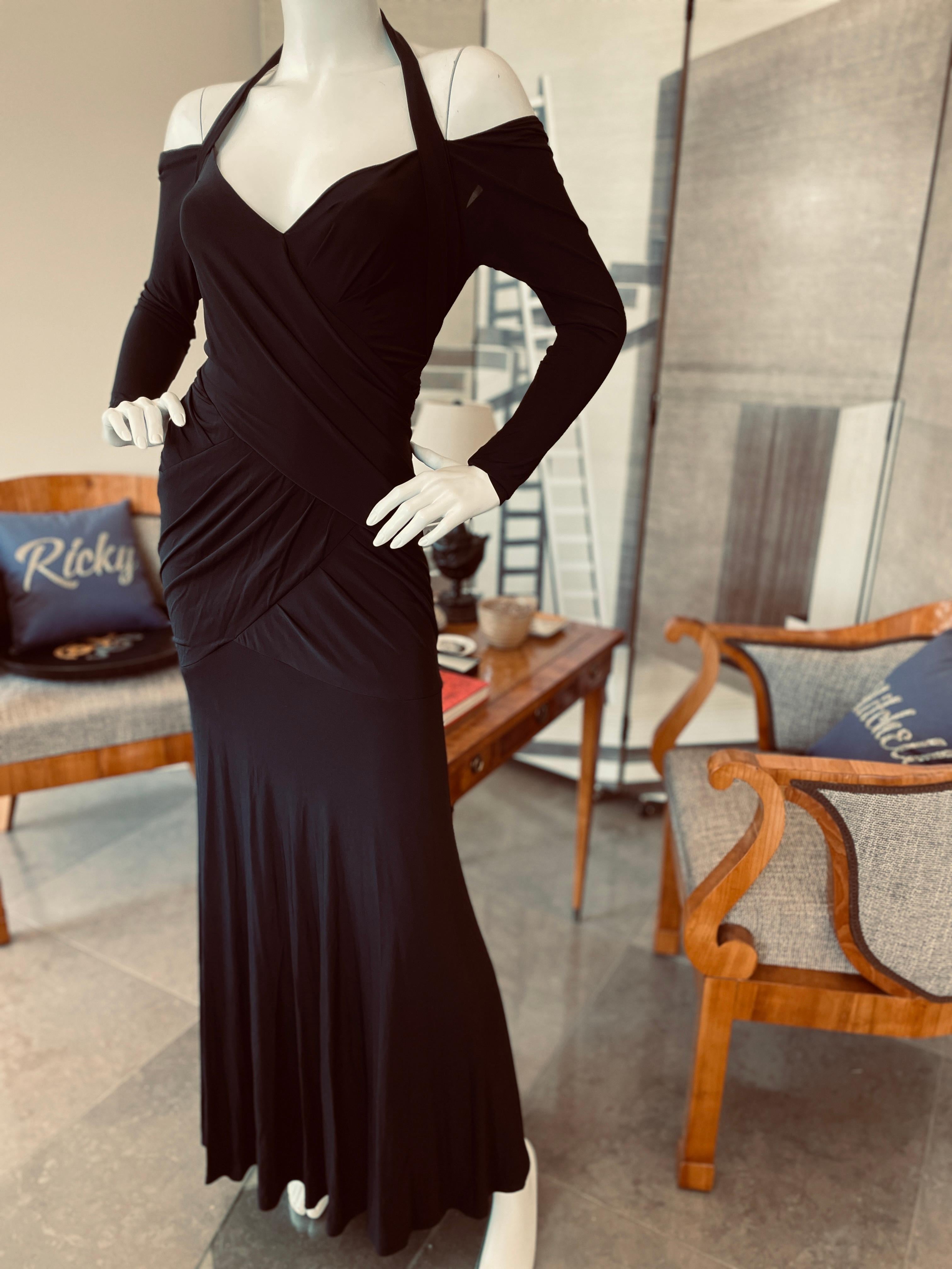 Donna Karan Vintage 1990's Plunging Black Cold Shoulder Jersey Evening Dress
Size M, there is a lot of stretch
Bust 34