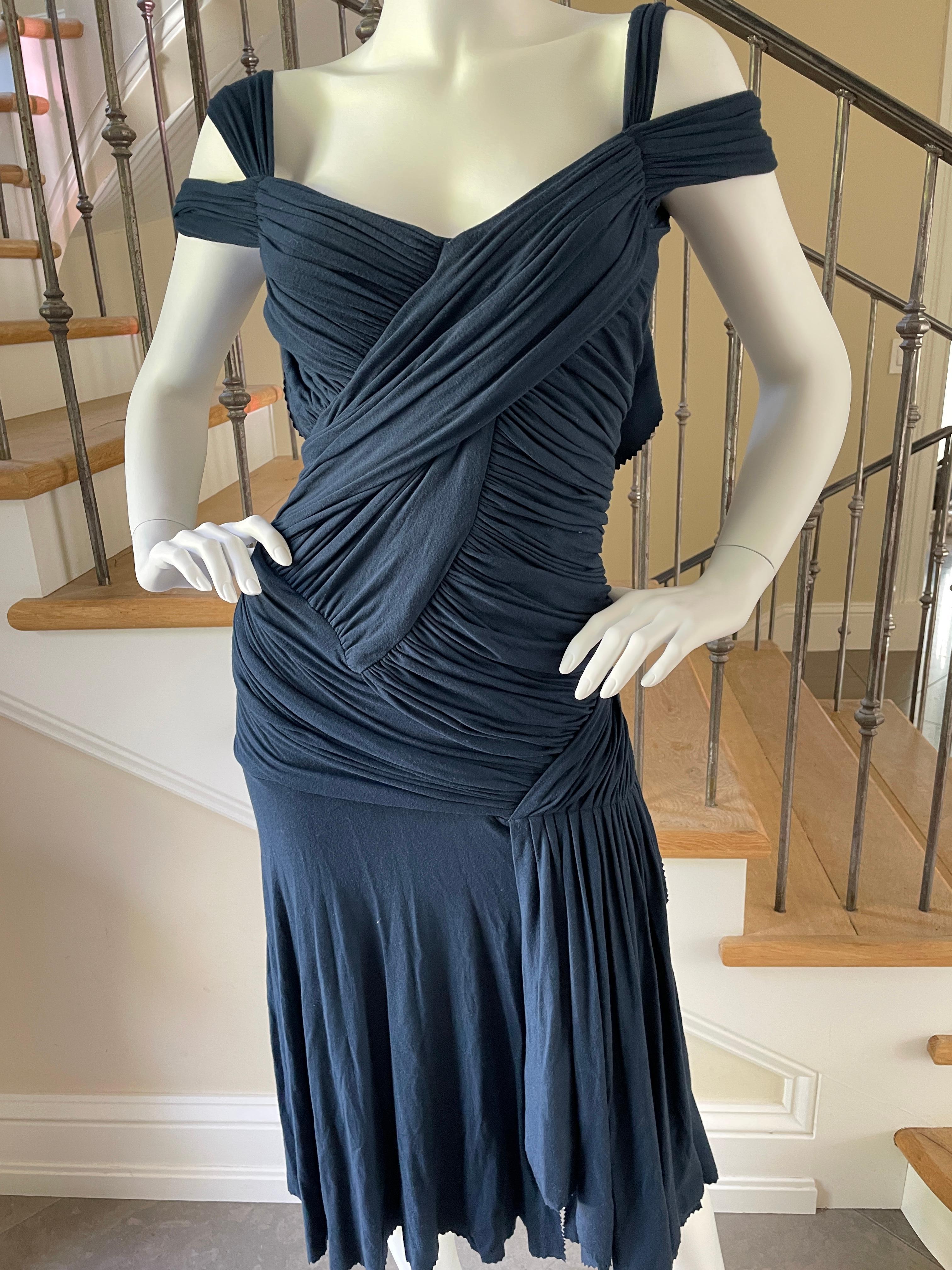 Donna Karan Vintage 1990's Draped Navy Blue Cocktail Dress with Plunging Back
So pretty, this is quite structured in the corset, with underwire bra.
Size m, there is a lot of stretch.
Bust 38