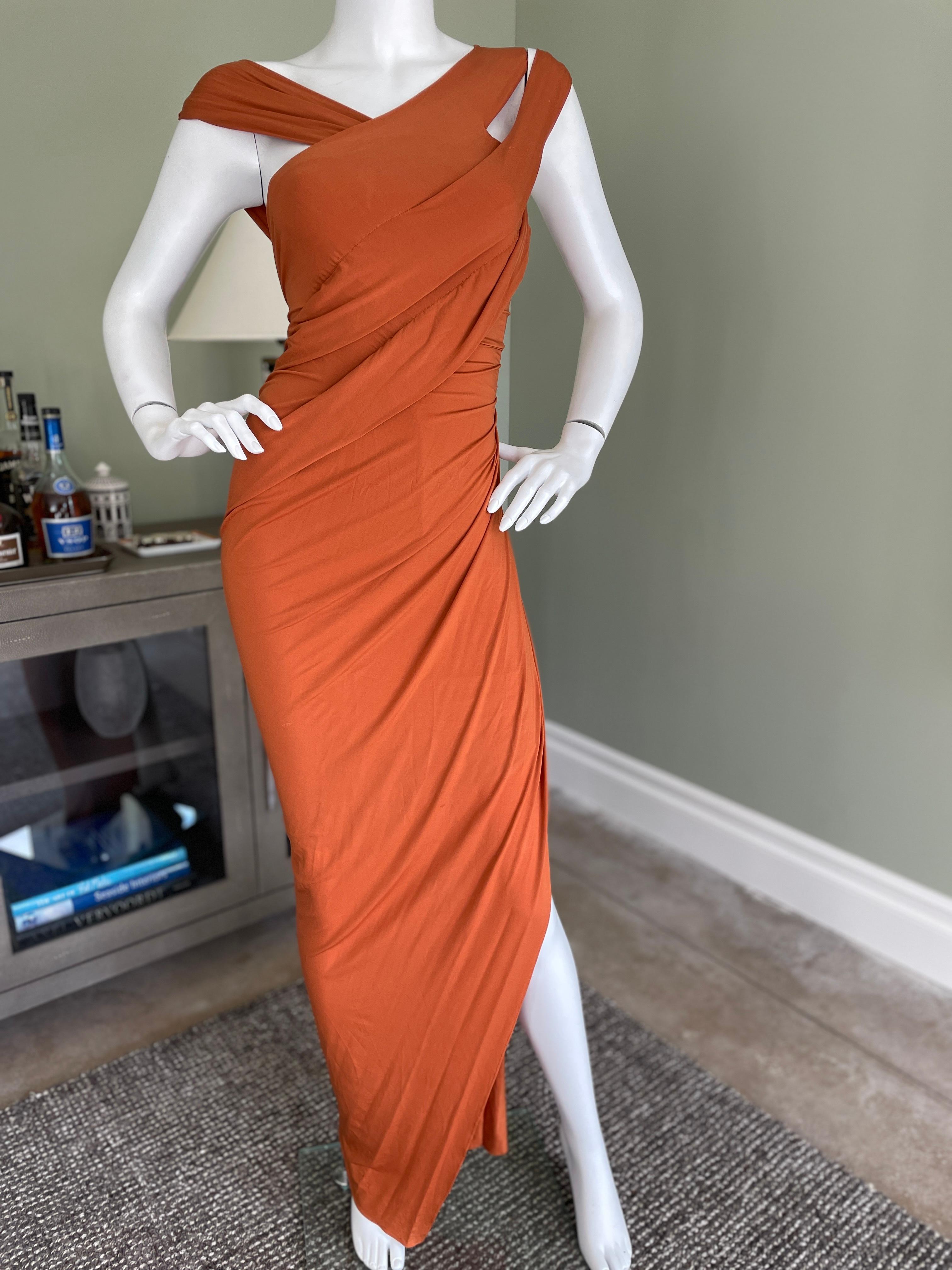 Donna Karan Vintage 1990's Orange Evening Dress with High Side Slit
 This is so pretty , it is much sexier than the photos show.
 Size 4 there is a lot of stretch
 Bust 32