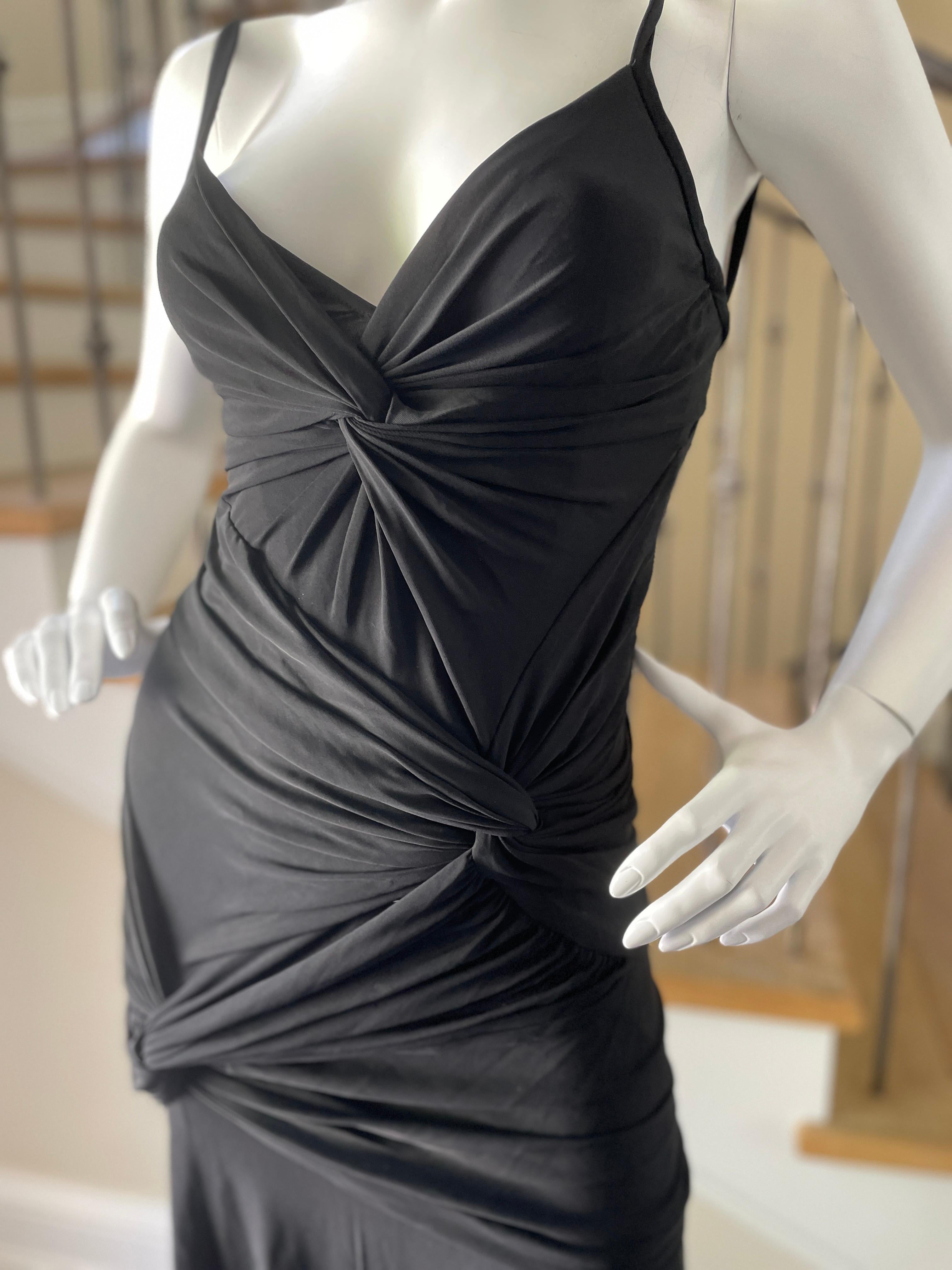 Donna Karan Vintage 1990's Plunging Black Knot Dress
Size M, there is a lot of stretch.
Bust 34