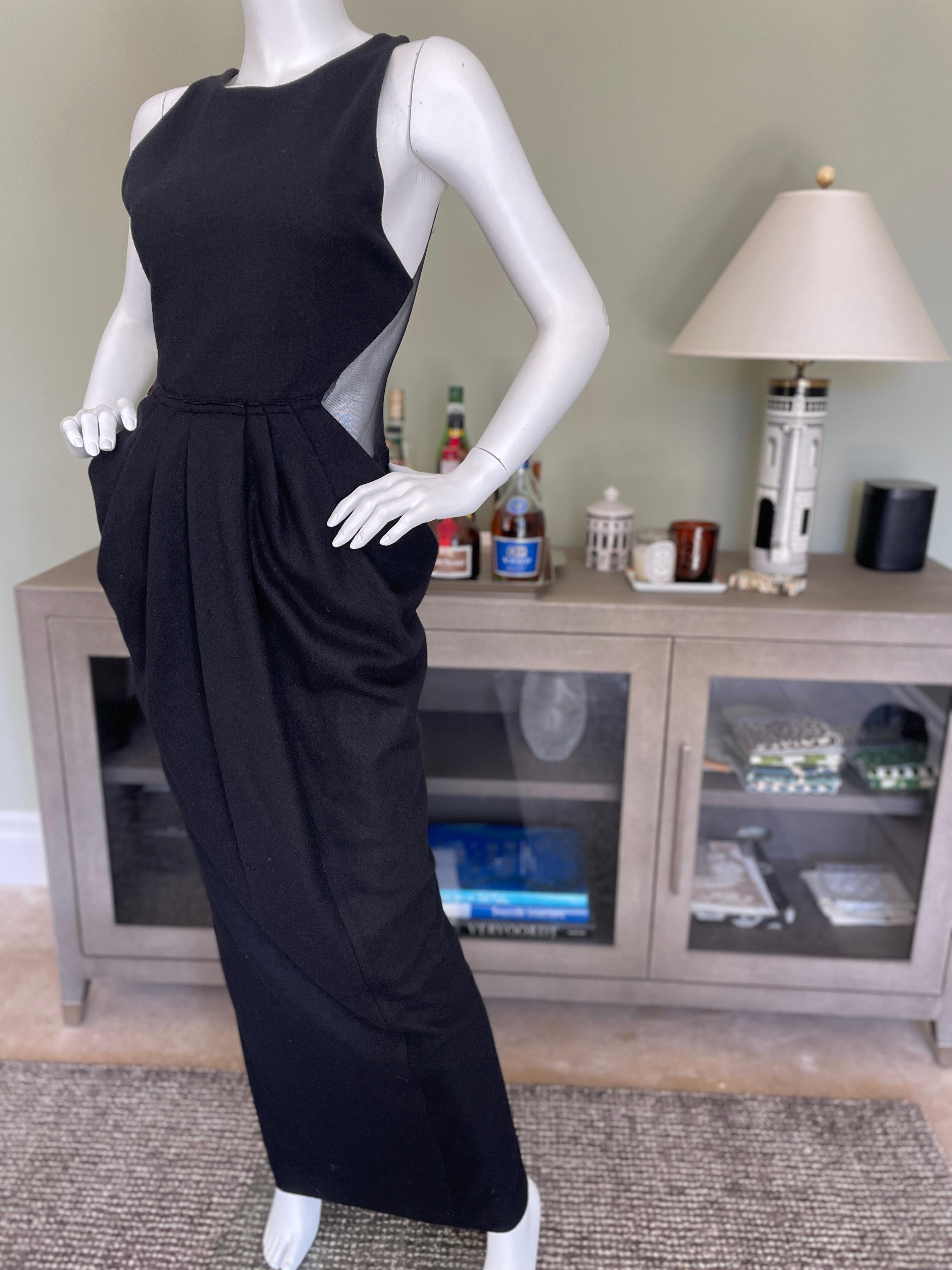 Donna Karan Vintage Black Evening Dress with Sheer Back.
There are big pockets.
 Size M
 Bust 36
