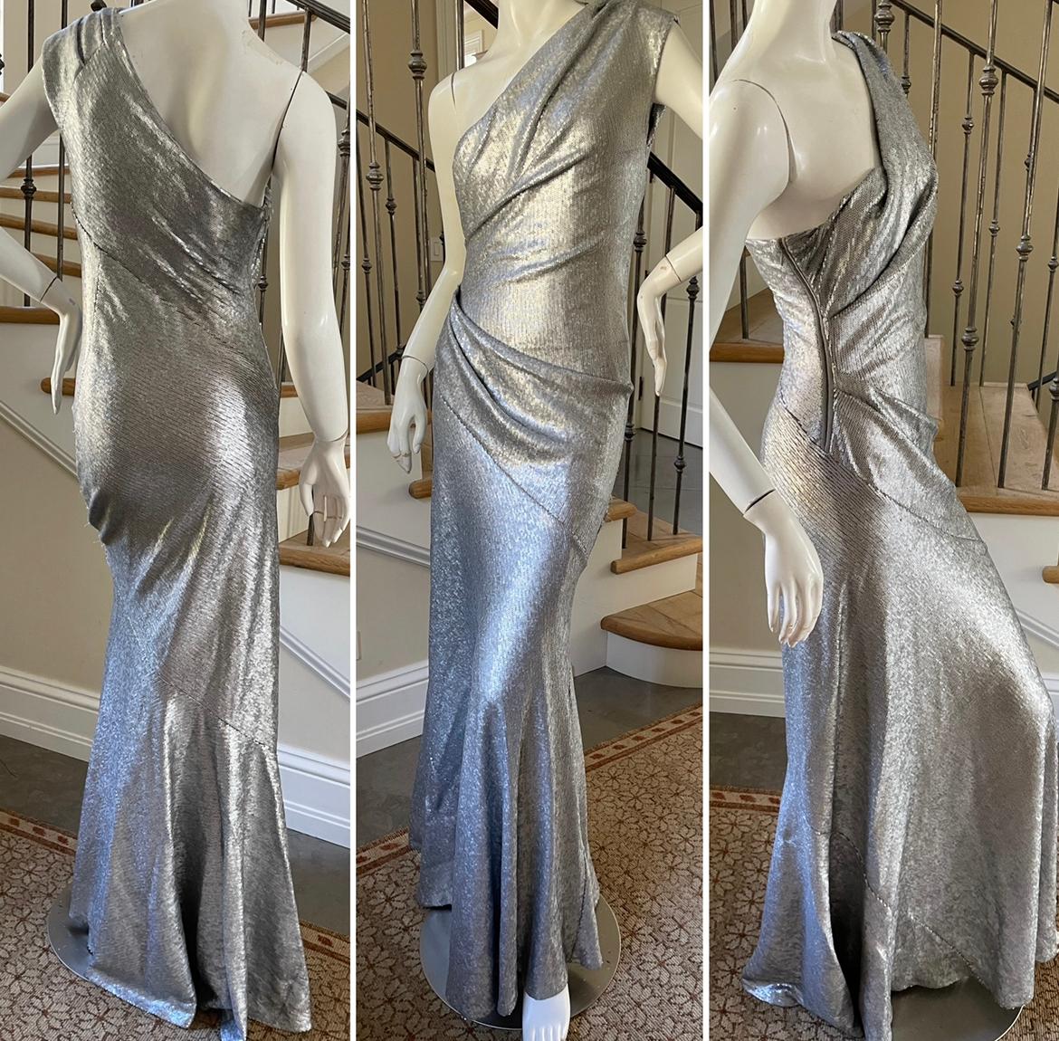 Donna Karan Vintage Matte Silver Sequin One Shoulder Evening Dress

This is so pretty. There is a lot of stretch.
Size 4
Bust 34