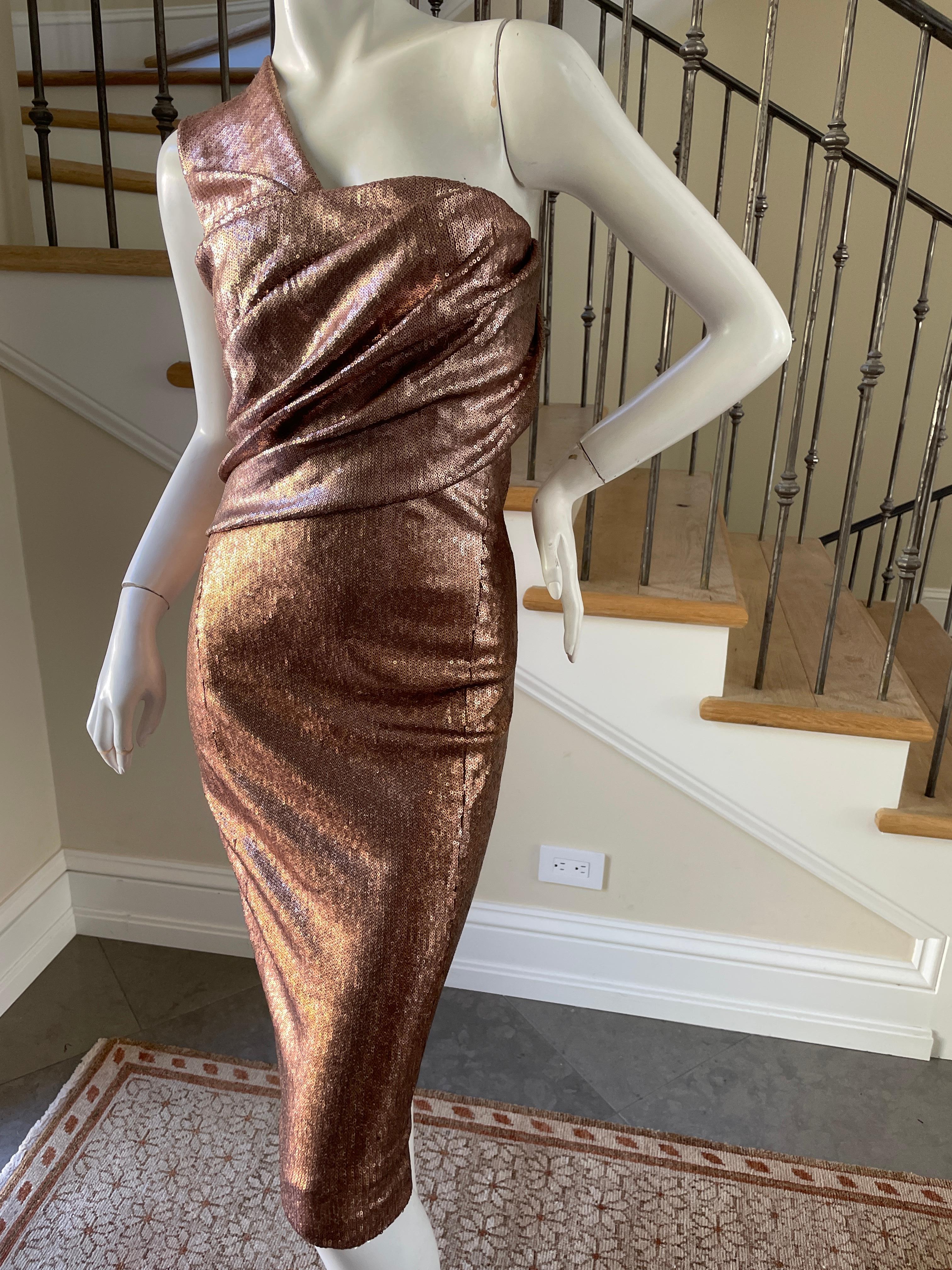 Donna Karan Vintage Metallic Copper Sequin One Shoulder Cocktail Dress.
New with tags  it retailed for $2195
This is so pretty. There is a lot of stretch.
Size 6
Bust 34
