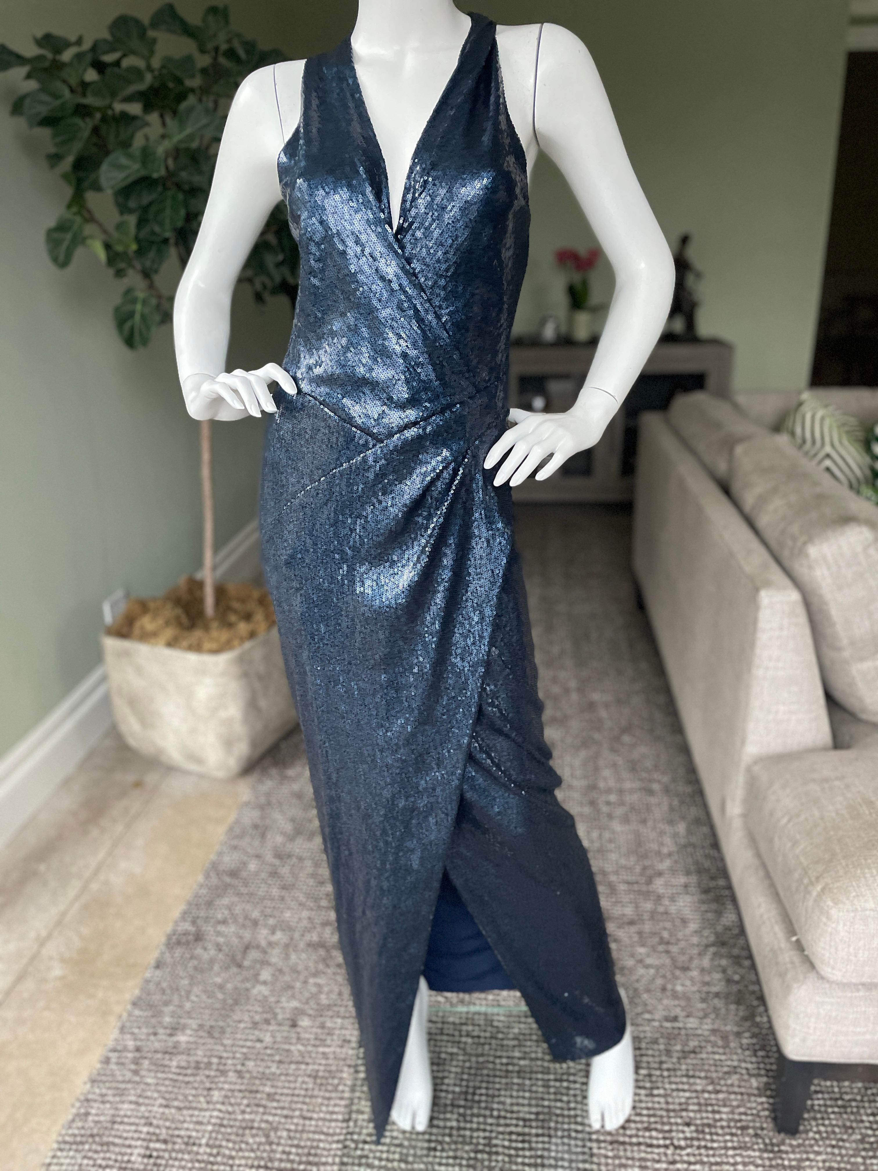 Donna Karan Vintage Navy Blue Sequin Plunging Stretch Dress  
 This is so pretty , it is much sexier than the photos show.
 Size 4 there is a lot of stretch
 Bust 34