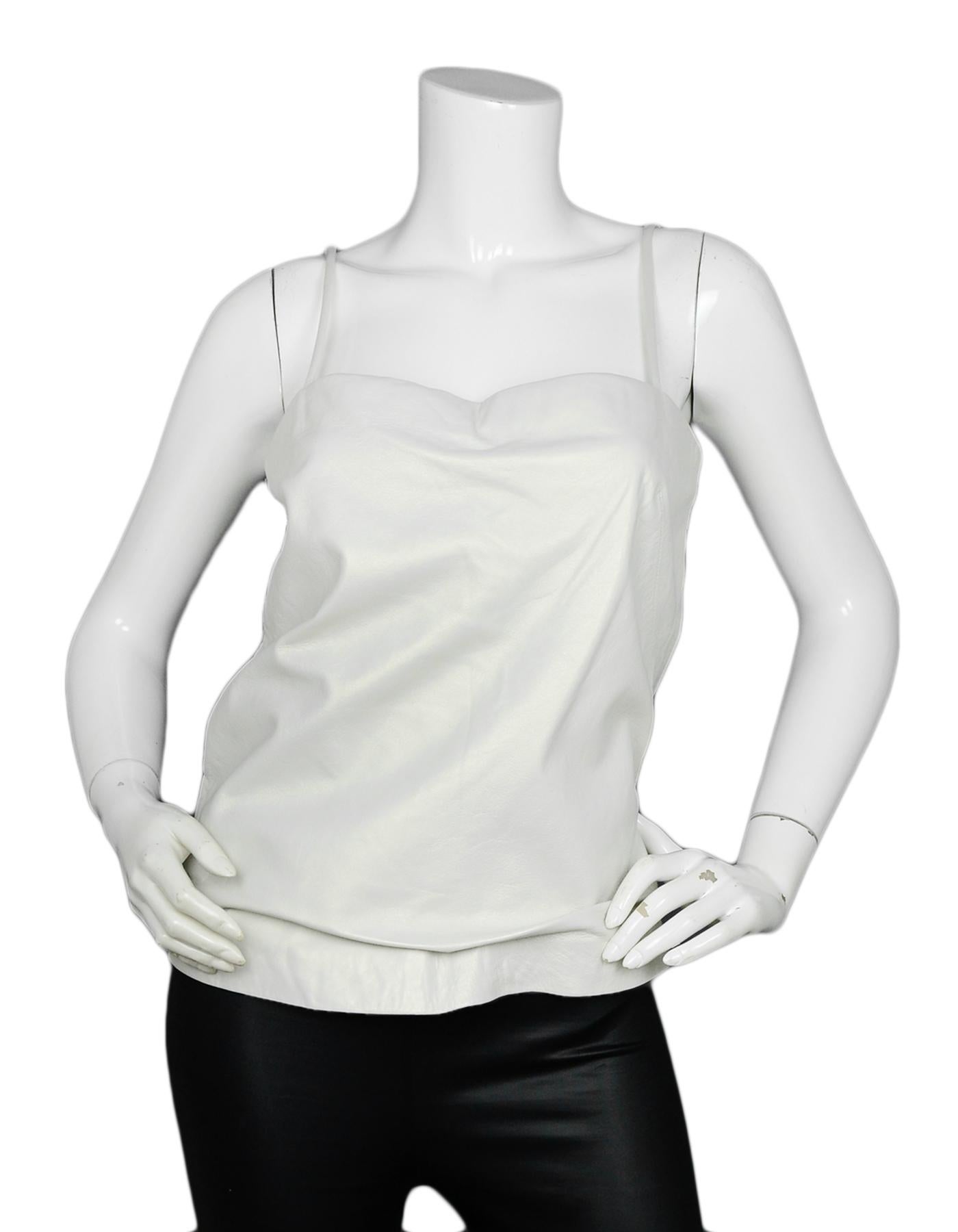 Donna Karan Spaghetti Strap Leather Top sz 10 

Made In: USA 
Color: White
Materials: 100% Lambskin leather
Lining: Fine textile, believed to be silk.
Opening/Closure: Back zip
Overall Condition: Excellent pre-owned condition 

Tag Size: US 10