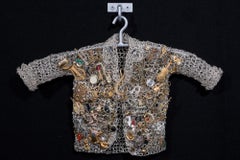 Life Love, Crocheted Silver Metal Coat Sculpture with Musical and Sports Charms