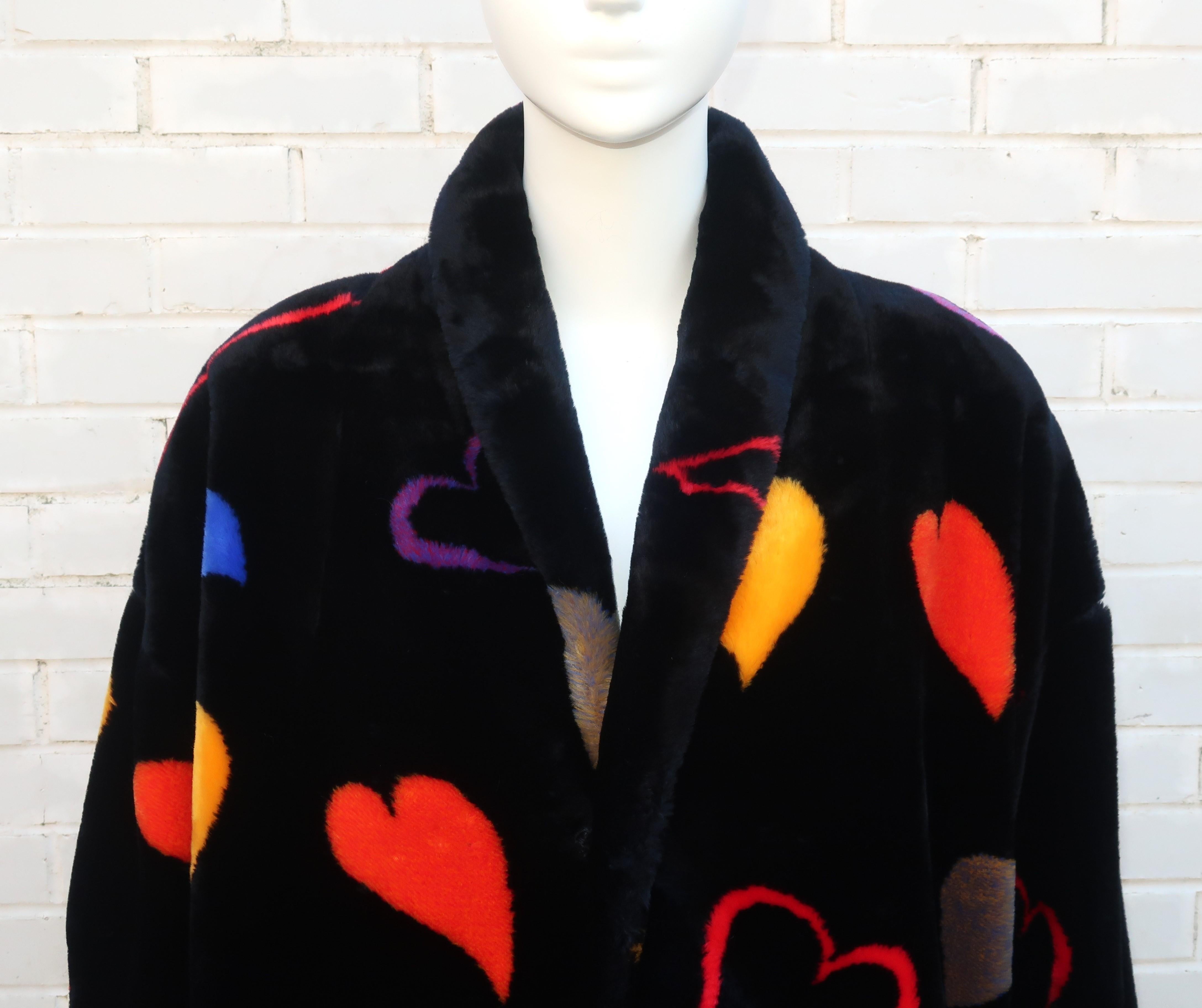 Be someone’s Valentine with this ultra lush faux fur Donnybrook teddy coat with a floating hearts motif.  The comfy silhouette hooks at the front with hidden pockets and rolled cuffs at the sleeves.  The pop art style hearts would make Andy Warhol