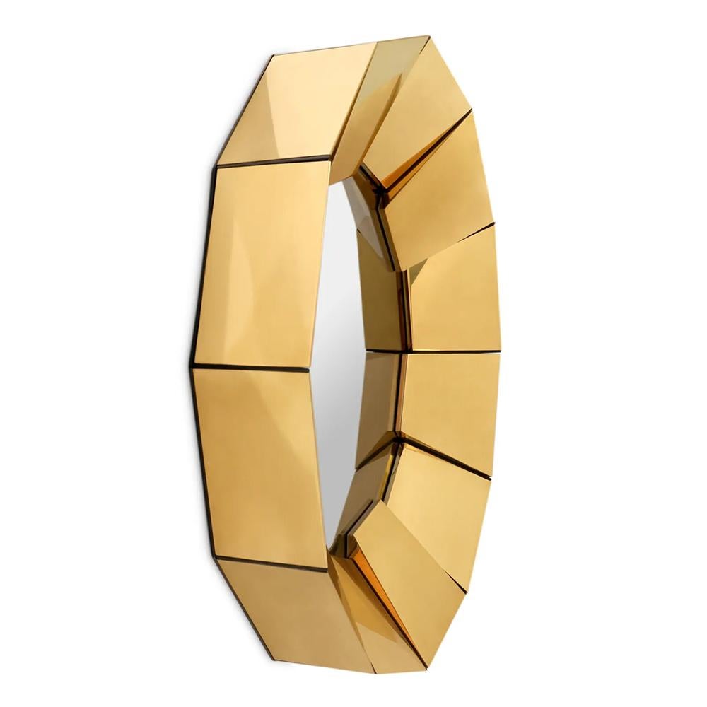Spiegel Donovan Gold mit Rahmen aus 12 Teilen
aus massivem Messing in polierter Ausführung. Mit runder Mitte 
spiegelglas.