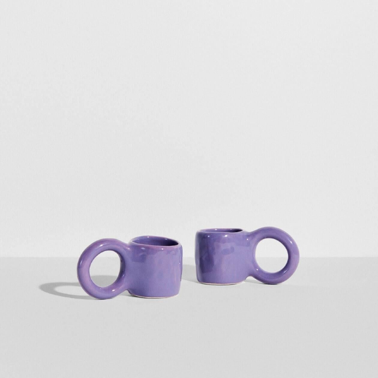 In creating the Donut collection, designer Pia Chevalier drew her inspiration from the world of baking. The ceramic artist designs her espresso like pastries, where the cup handles mimic doughnut pastry, and the enamel finish renders a sugar-glazed