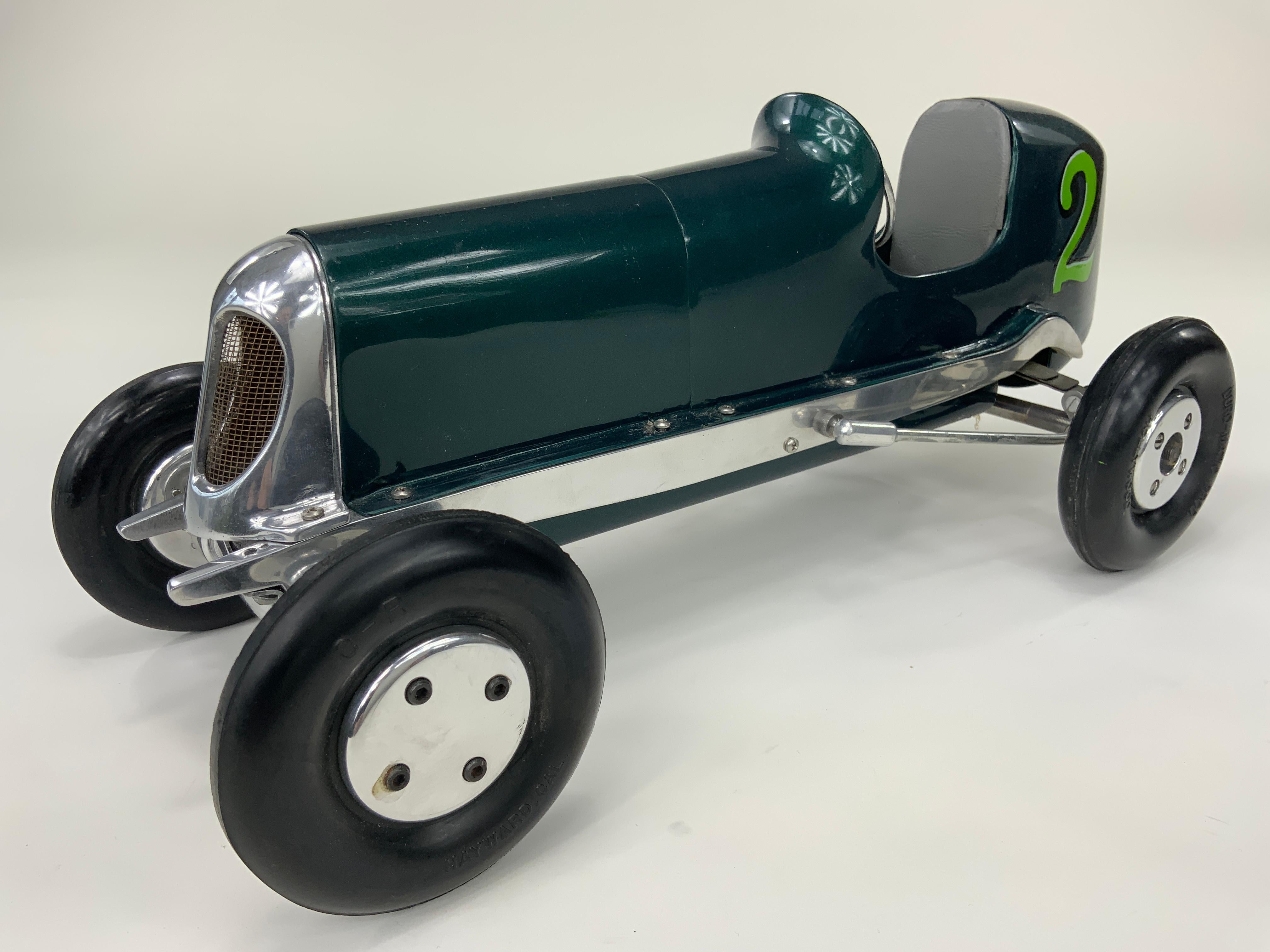 This is a Dooling Mercury First Series tether car built in 1939 by the Dooling brothers, Tom, Russell and Harris.  They began building racers in 1937 for their own pleasure.  These early crude, buggy-type creations, powered by model airplane motors,