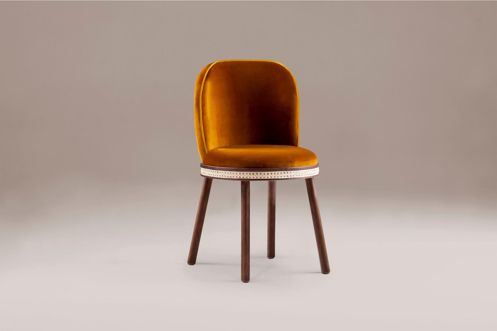 DOOQ Mid-Century Modern Dinning Chair Alma Deep Orange Velvet, Walnut Woods Legs

In a piece that combines classic and modern aesthetics we can find a certain harmonic gracefulness paired with an intimate voluptuousness that can embrace you and