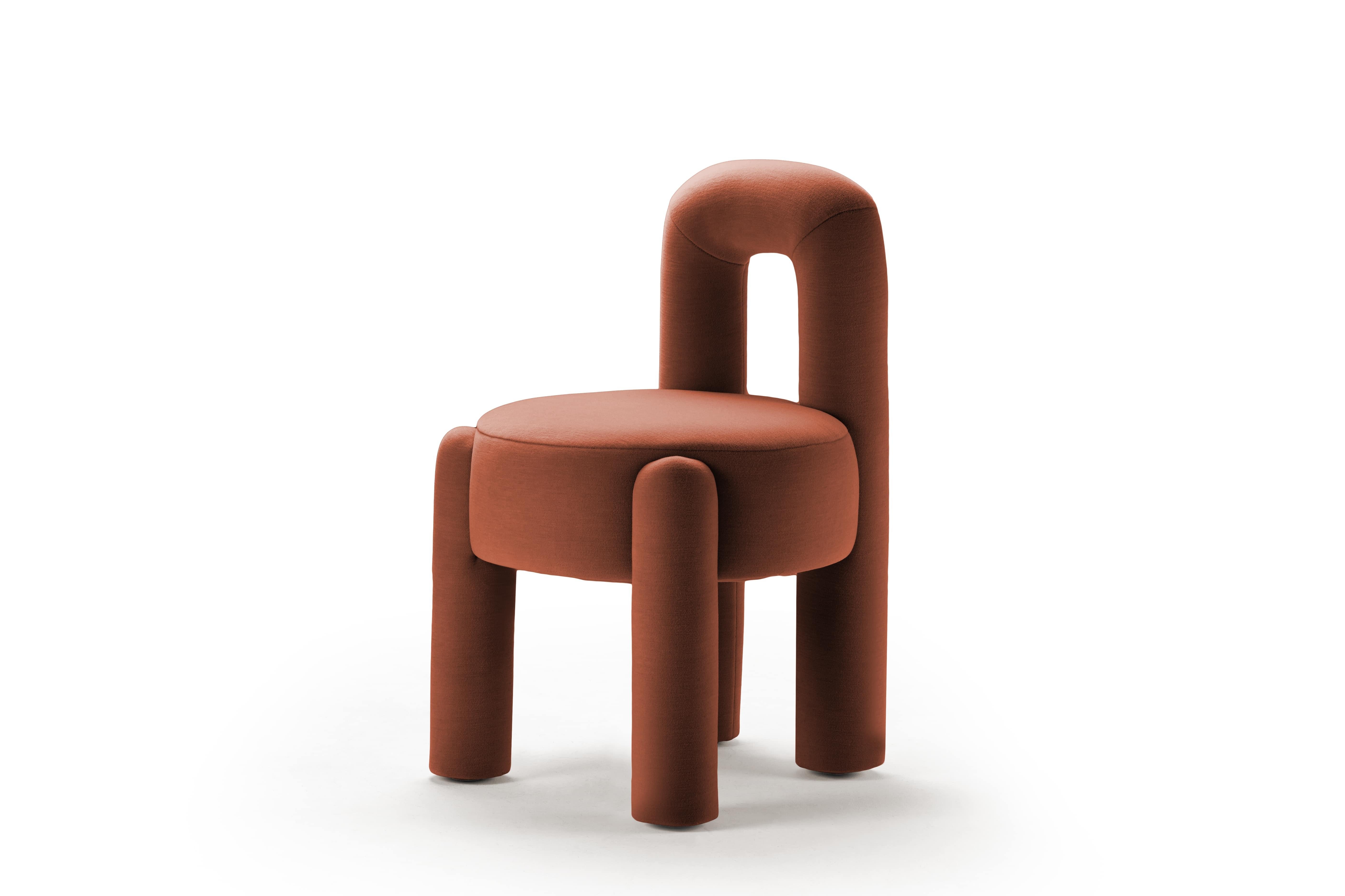 When pure geometry meets soft curves, something sculptural and sensual comes out. A fine dialogue between oversized legs and clean lines takes place in this piece upholstered in mohair velvet. Marlon is edgy and elegant at the same time, letting the