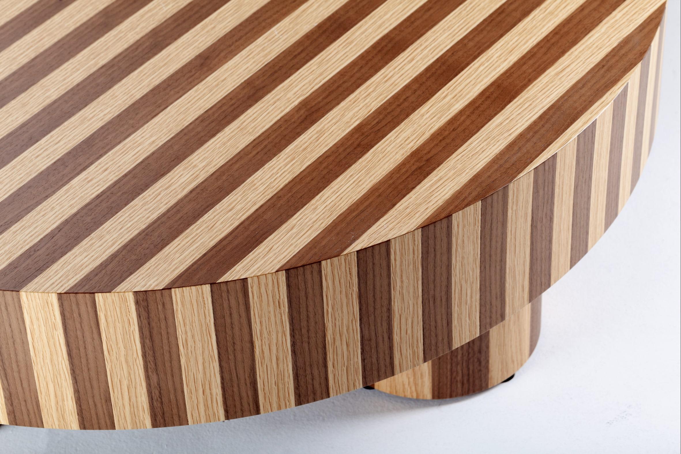 Nusa is our latest table collection, where Southeast Asian inspiration meets modern craftsmanship. Each table intricately weaves an ancient marqueterie technique, seamlessly blending two distinctive woods. Immerse your space in the rich cultural