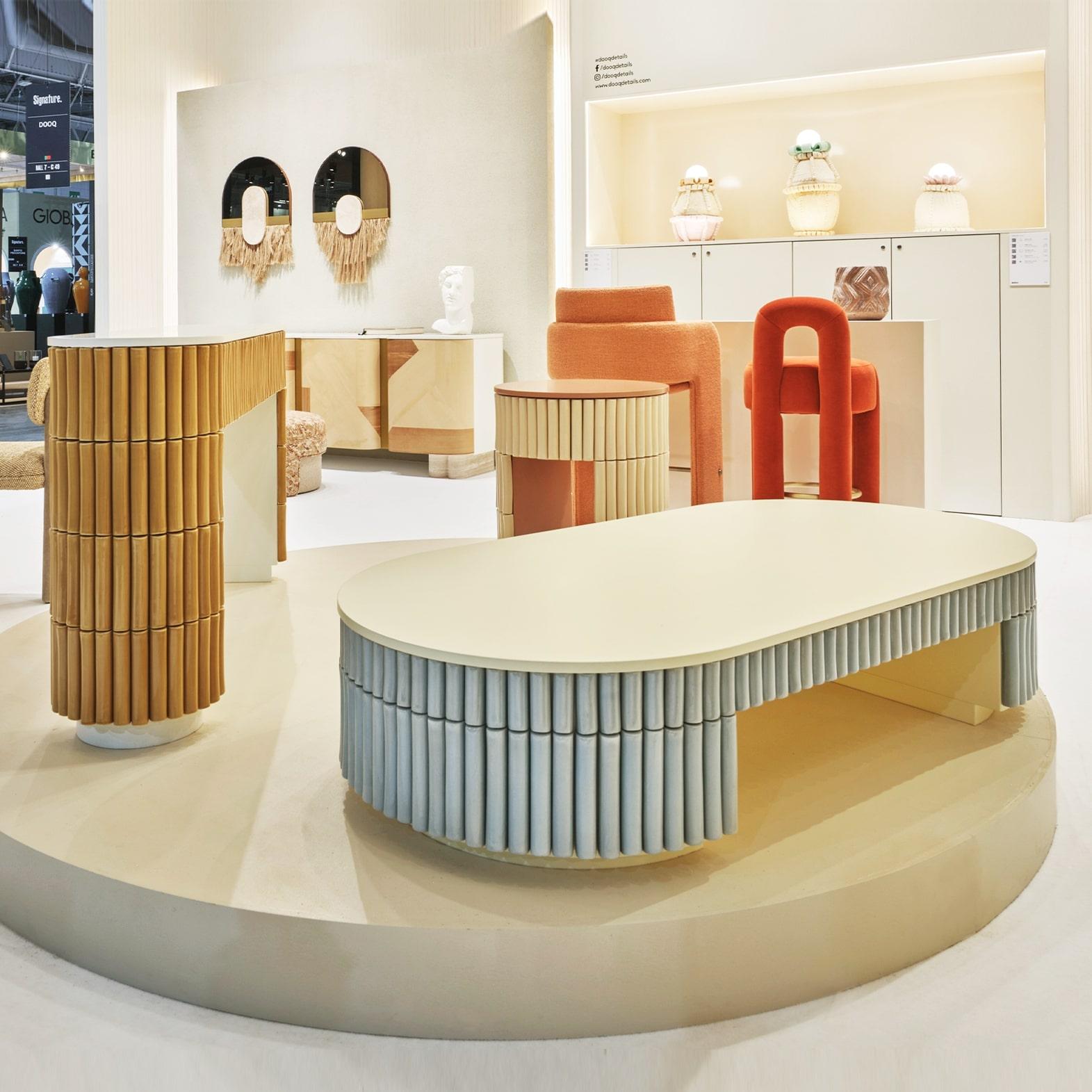 Exceptional in its craftwork, Nouvelle Vague is a center table that rejects traditional conventions in favor of experimentation. Round ceramic handmade pieces, painted in a unique craquele glaze are placed around a lacquered center top, creating a