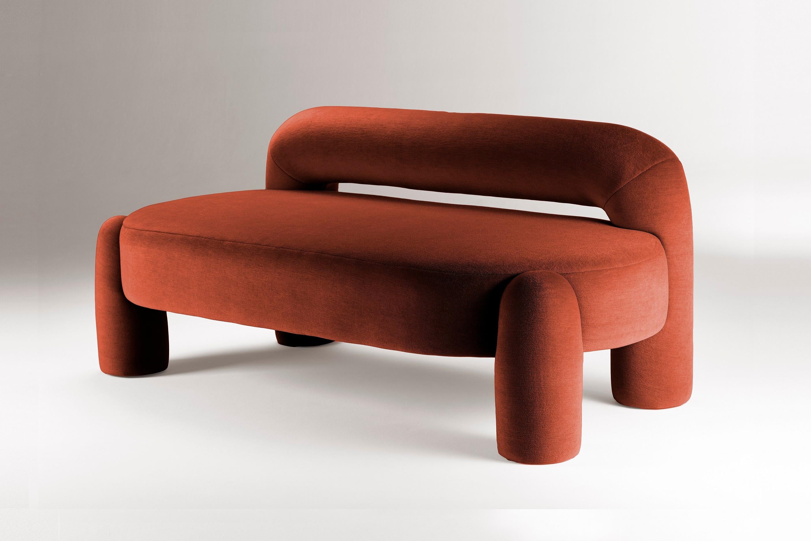 When pure geometry meets soft curves, something sculptural and sensual comes out. A fine dialogue between oversized legs and clean lines takes place in this piece upholstered in mohair velvet. Marlon is edgy and elegant at the same time, letting the
