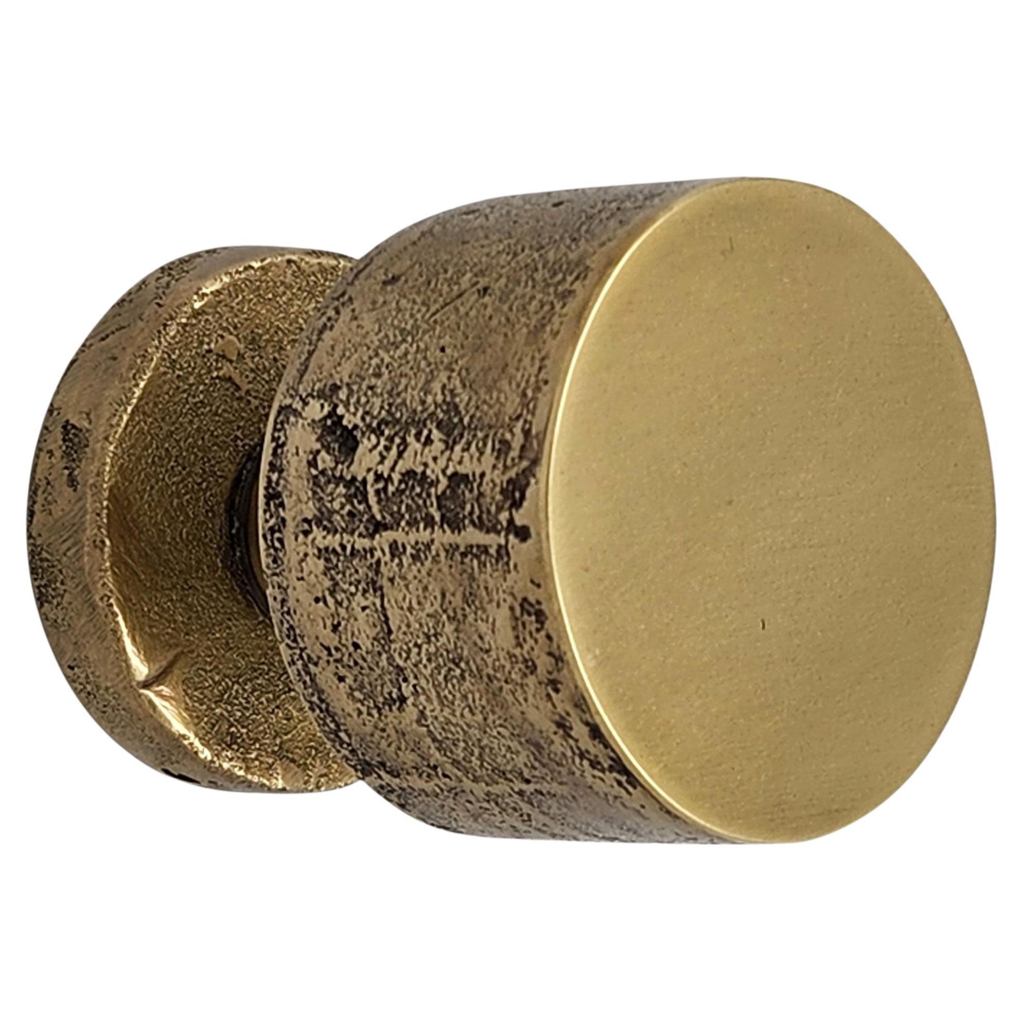 Door handle knob in solid brass: Minimalism and organic textures