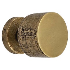 Door handle knob in solid brass: Minimalism and organic textures