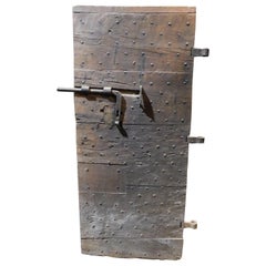 Door in oak from an old prison with original iron, Italy