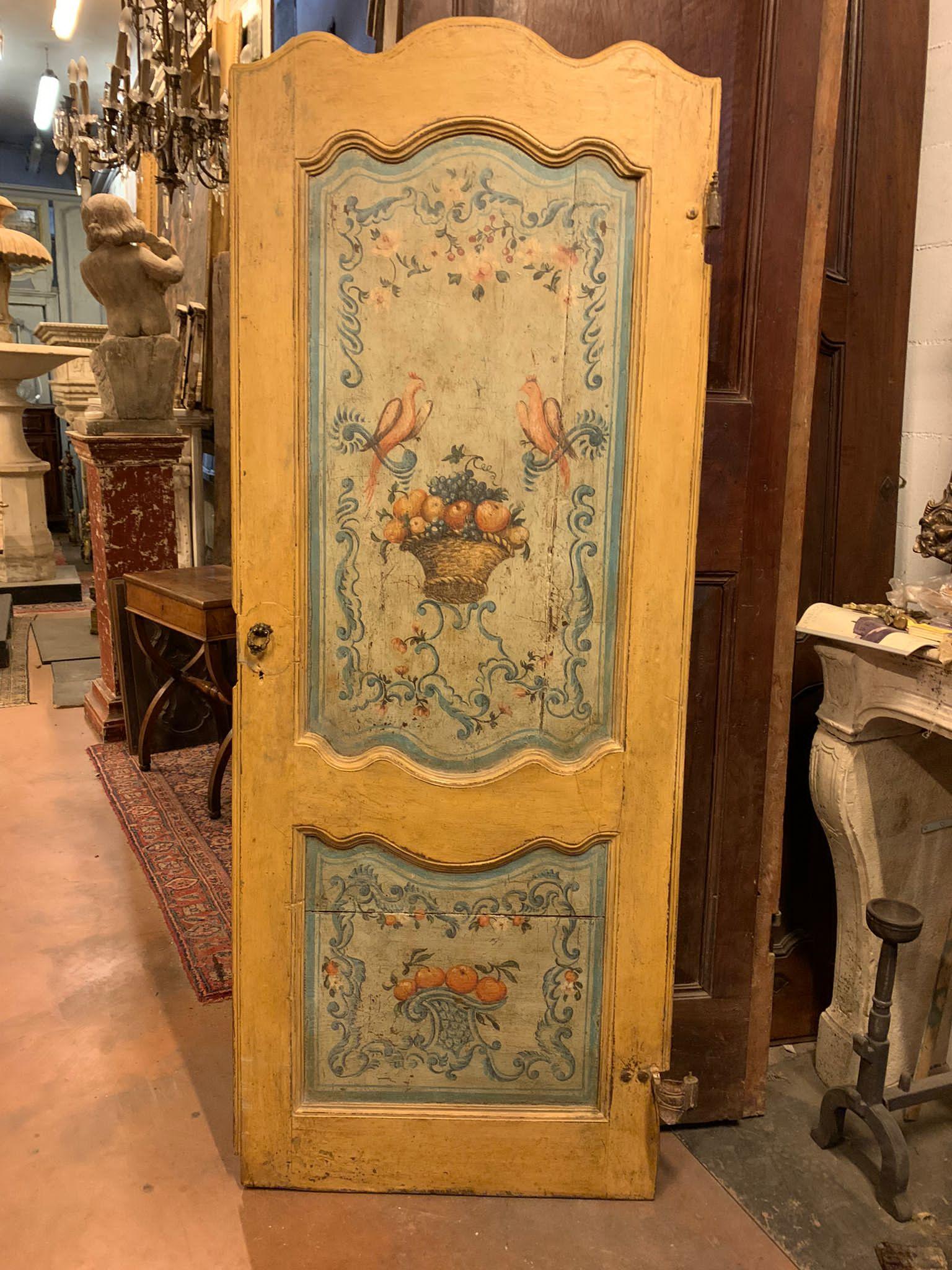 Ancient lacquered door with hand-painted panels, richly decorated with flowers, vases, fruits and birds, double-sided and therefore also painted on the back, still has original irons that were mounted on the frame (there are none), built in Italy