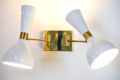 Doppio, pair of sconces rotating with pivot heads, twin lights. Piattelli design