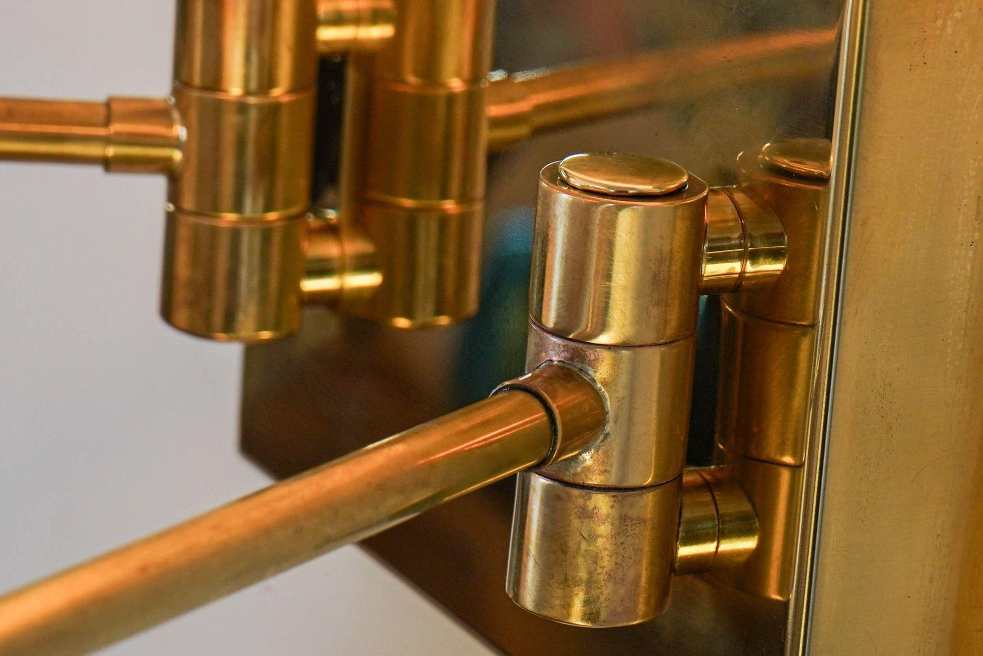 Italian Doppio, pair of sconces rotating with pivot heads, twin lights. Piattelli design For Sale