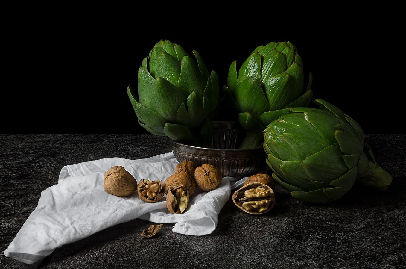 Alcachofas con nueces, Cebollas con jarrito, and Pumpkin (Triptych)  - Black Color Photograph by Dora Franco