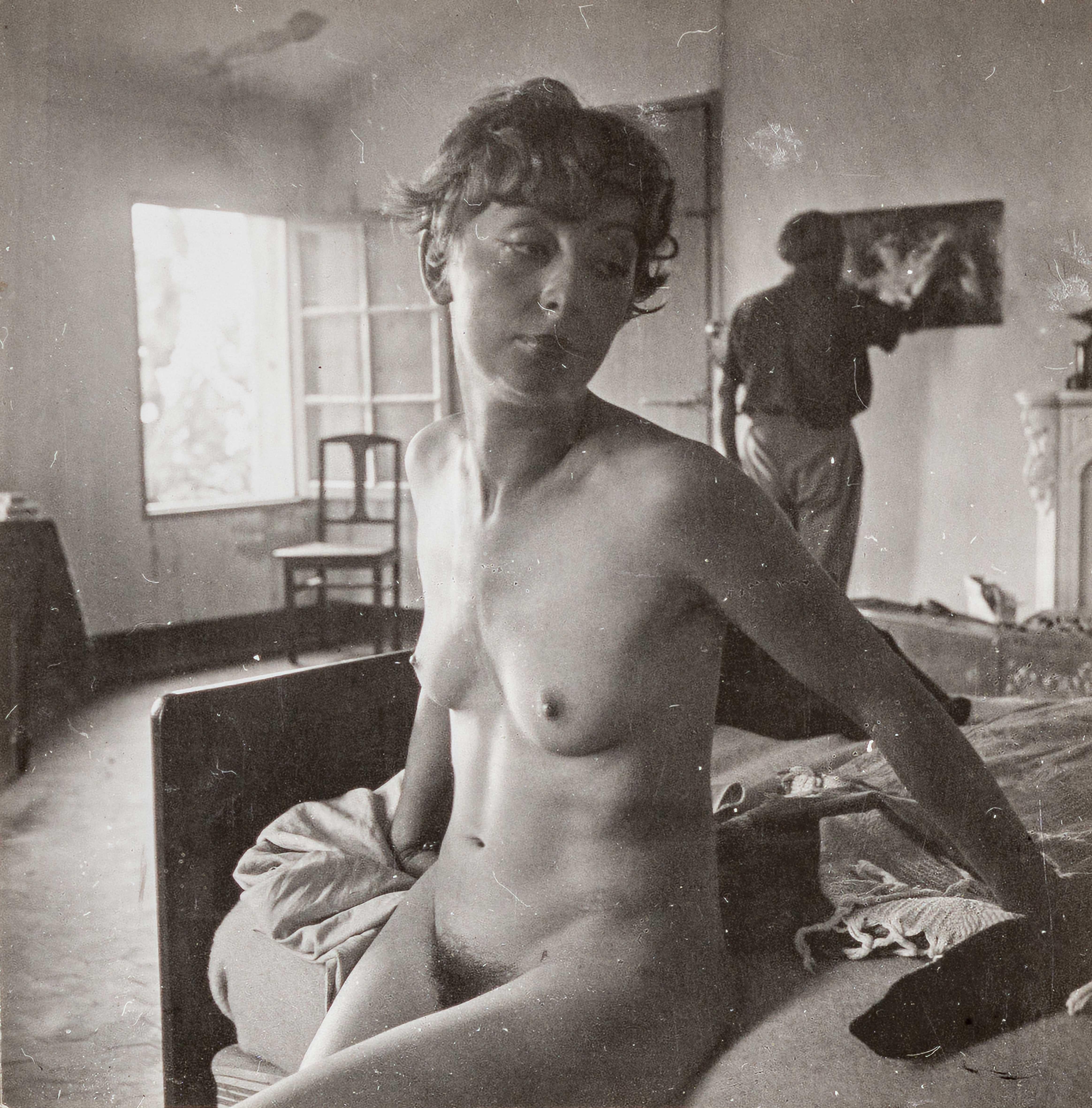 Dora Maar Black and White Photograph - Rosemunde Wilms with Pablo Picasso Painting in the Background in his Room