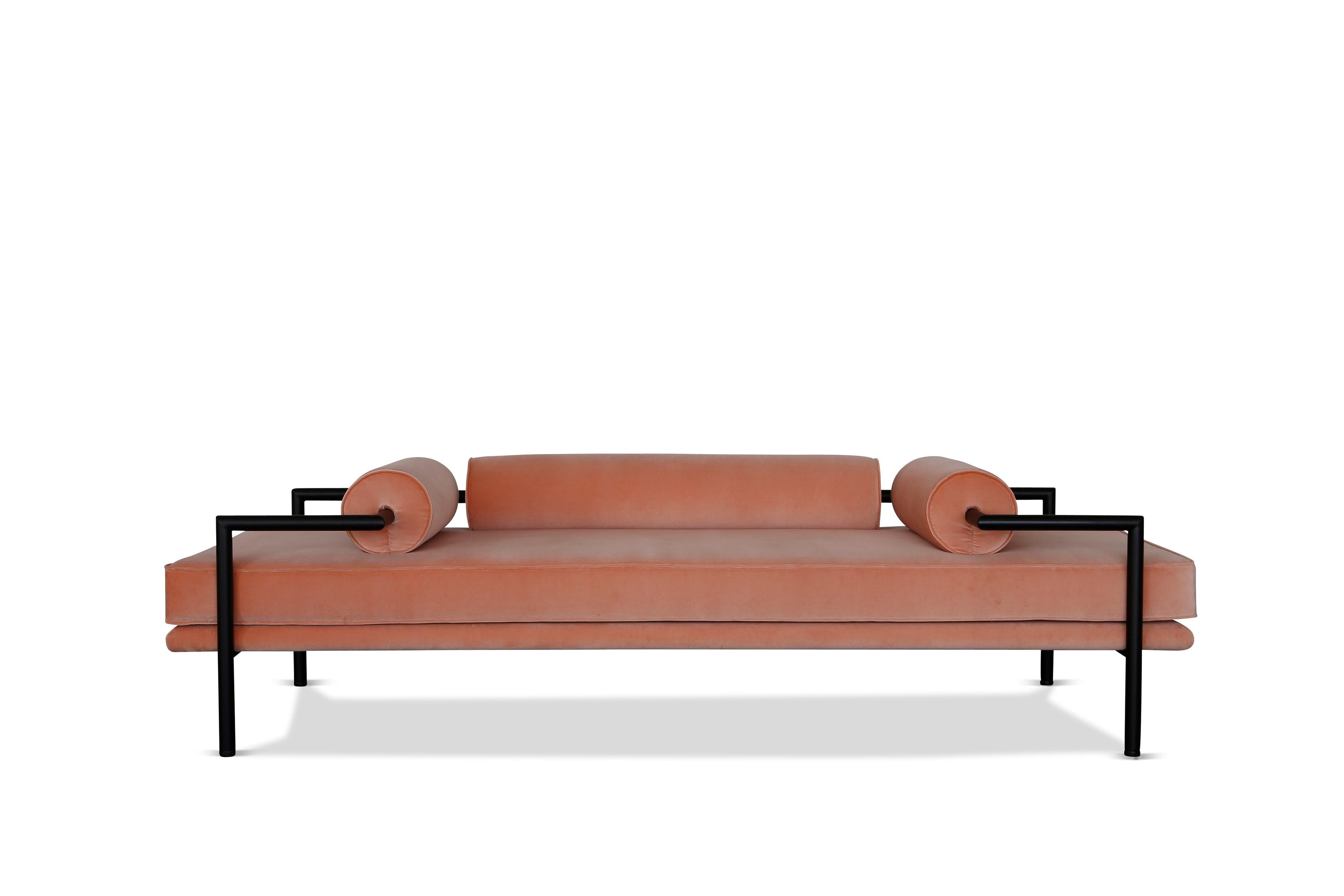 Inspired by the architecture of Luis Barragán, the Dorcia Daybed by Jorge Ibarra is a unique piece that focuses on form and function. The bolsters serve as head rests, arm rests or low back rests that divide the daybed into central seating for two