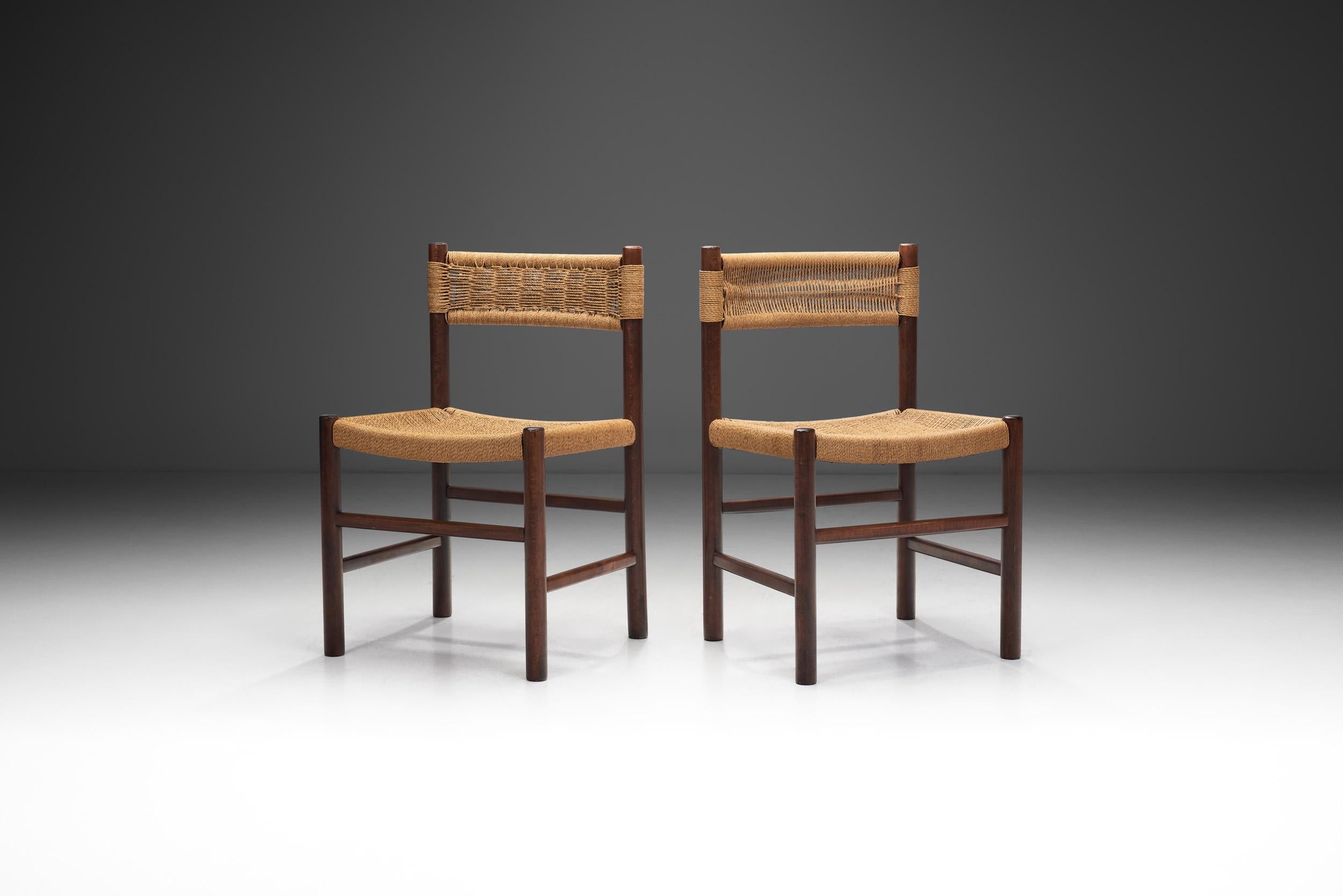 This charming pair of European dining chairs was born from a desire to create a design that was comfortable, organic, and cosy in its simplicity. The design, reminiscent of Charlotte Perriand’s famous “Dordogne” chair model, incorporates subtle, yet