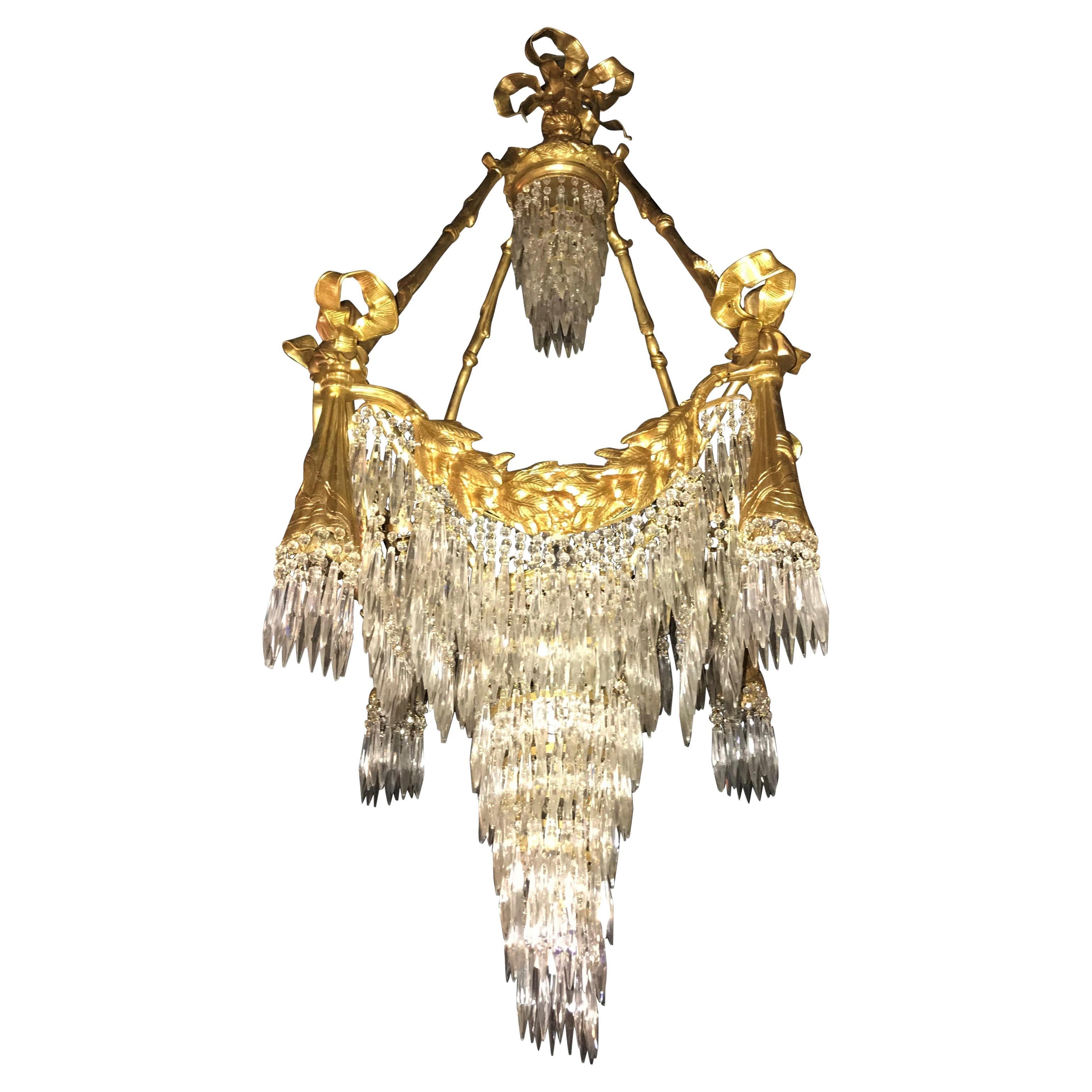 Doré Bronze Louis XVI Style Crystal Ribbon Tassel Drapery Chandelier For Sale