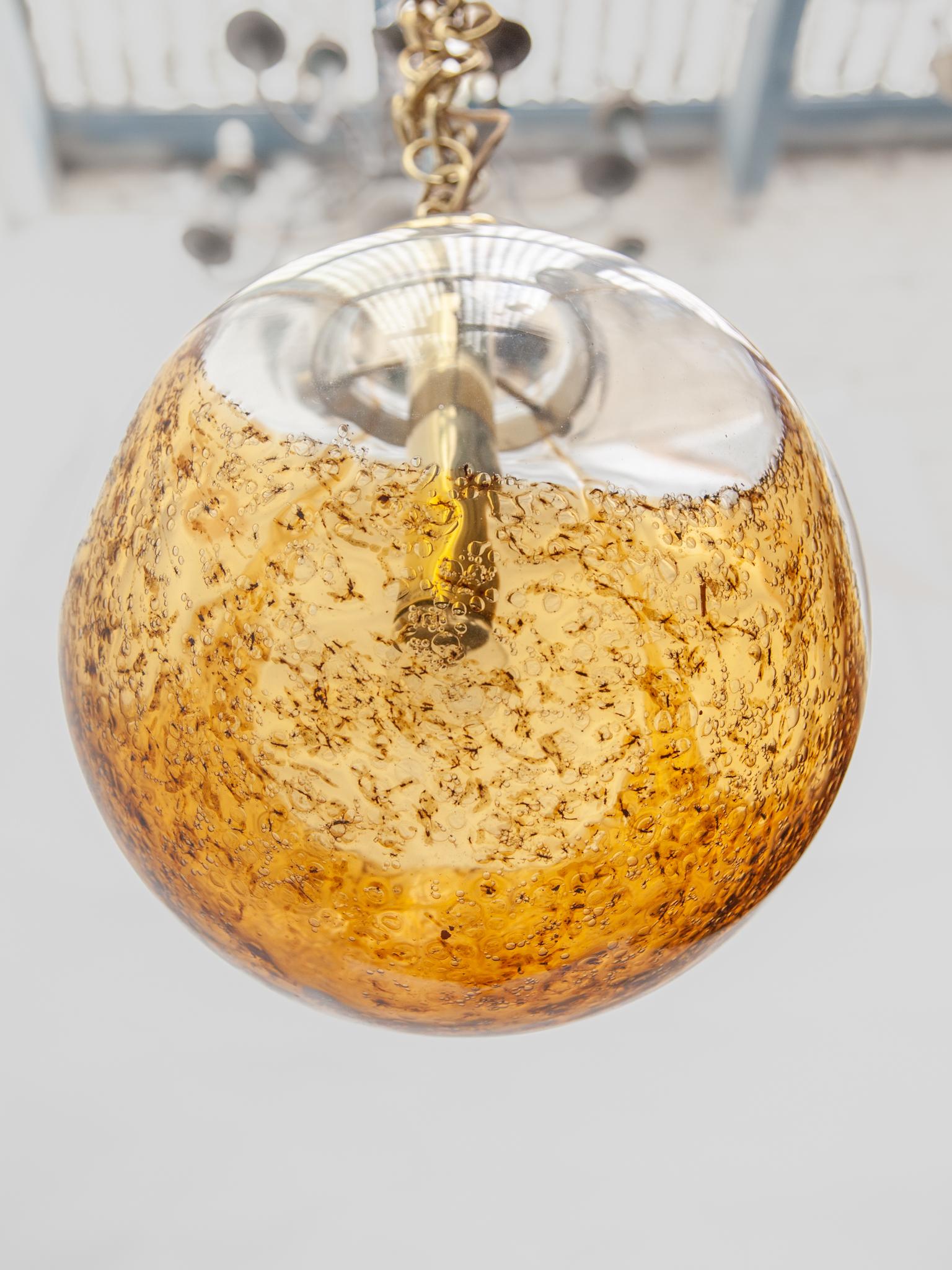 Doria Amber and Clear Glass Globe Pendant. For Sale 3