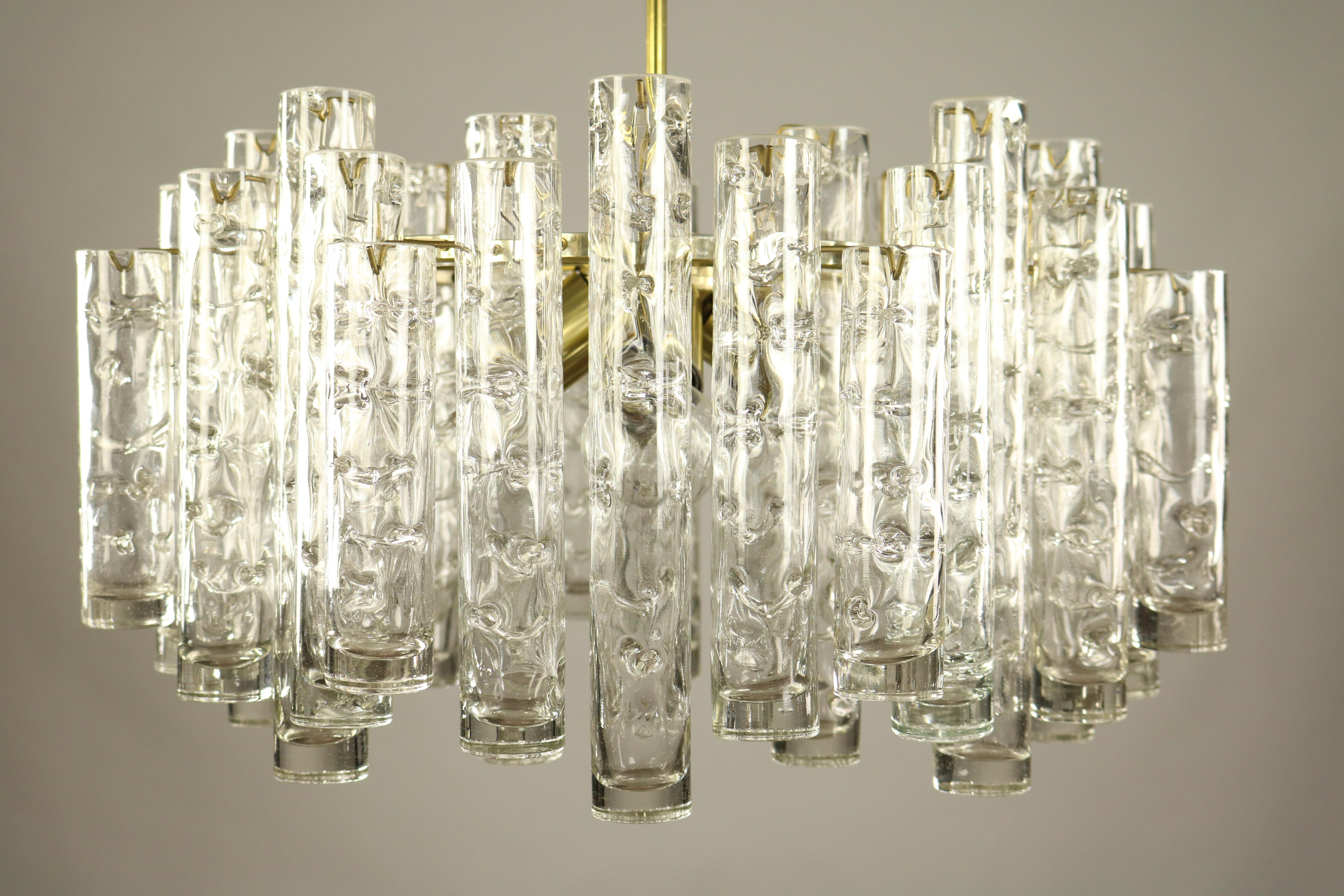 1960s Doria glass tube (one side closed glasses) chandelier
made of 36 hand blown tubes in three different length 11'' - 8 3/4'' - 6 1/3'' diameter glass tubes 1 1/2''
and a frame of aluminum and steel
total diameter 24 1/2'' / height total 27