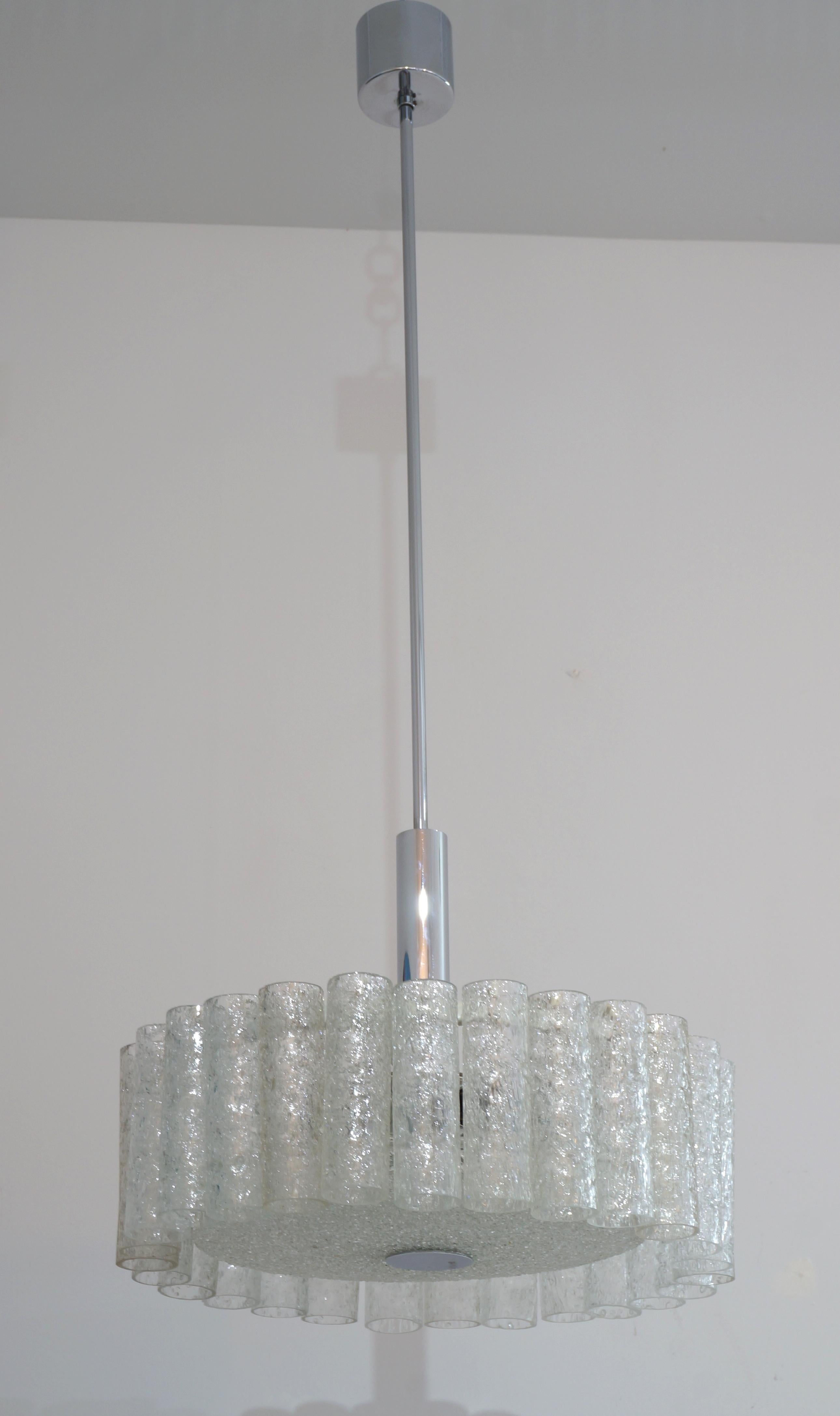 This stylsh Mid-Century Modern Doria Leuchten chandelier dates to the 1960s, and is fabricated with Murano 