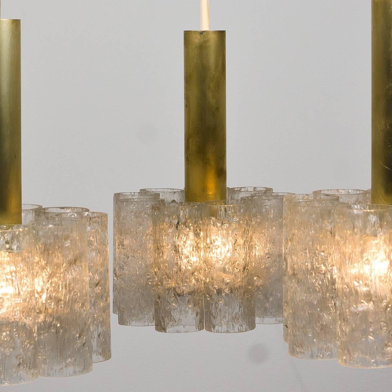 Doria light fixture, with five Murano textured glass tube pendants on polished nickel stems, German, circa 1960s.