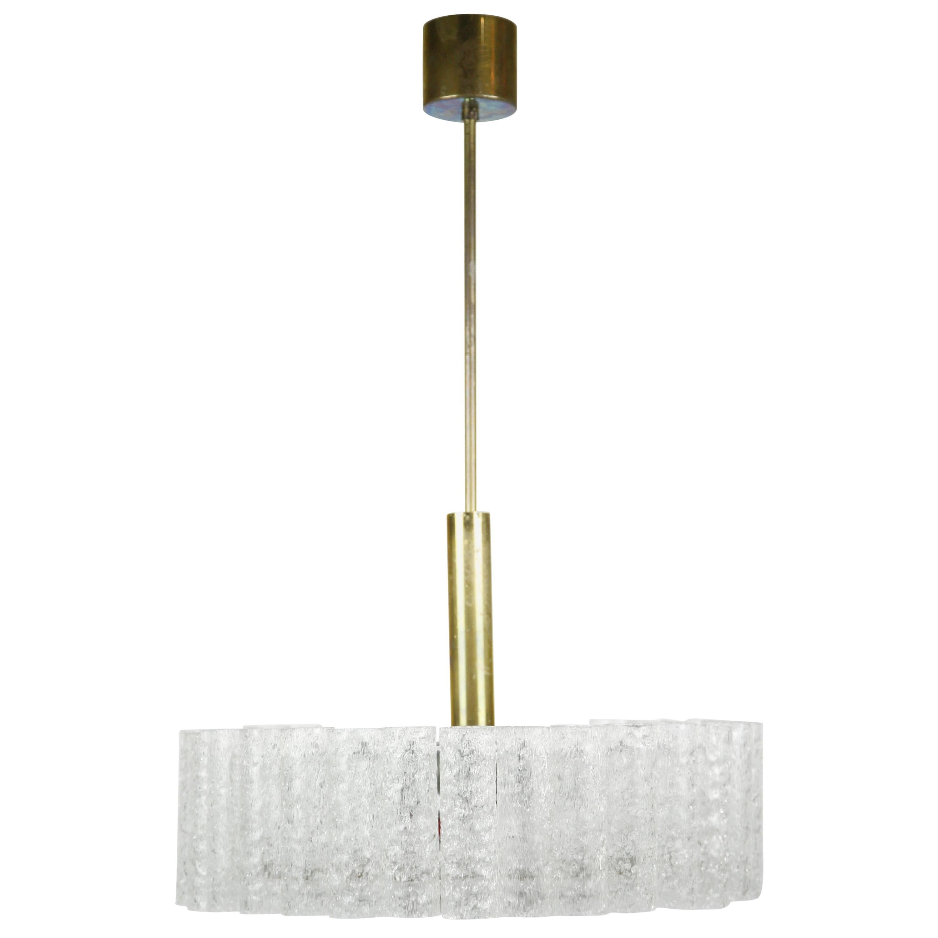 Doria tubular glass chandelier, 1960s, a metal frame with 32 frosted glass tubes a frosted glass diffuser surrounded by a brass disc with patina, all original with manufacturer sticker.
Six sockets.

Rewired for the US.

 