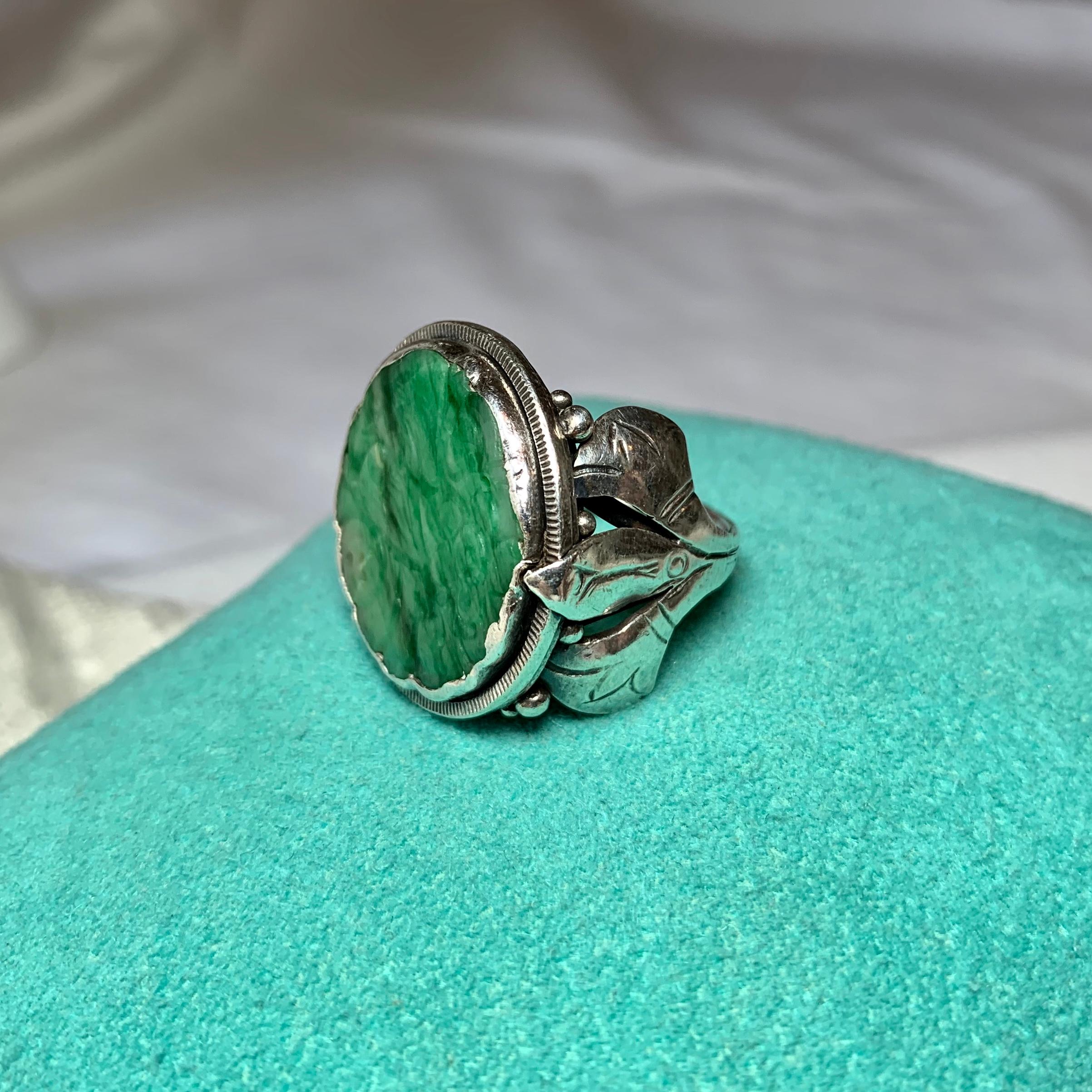 A very rare Museum Quality Arts & Crafts period, Mid-Century Modern carved Jade Ring in Handwrought Sterling Silver.  The jewel is a Mid-Century Modern masterpiece by the acclaimed artist Doris Cliff (1885-1968) of Chicago.   The ring is hand