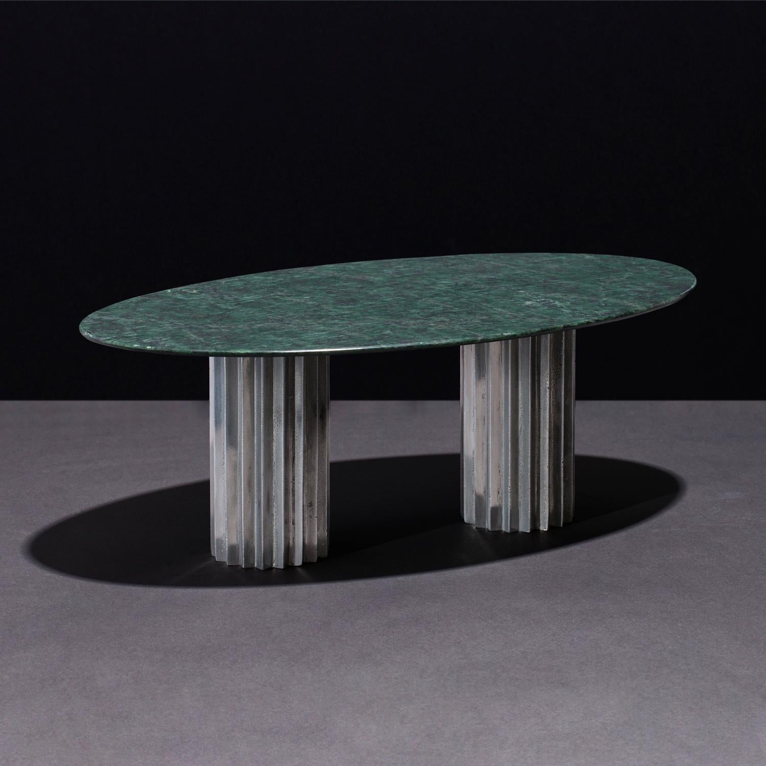 Doris Green Serpentino Marble Oval Dining Table by Fred and Juul
Dimensions: D 130 x W 220 x H 74 cm.
Materials: Aluminum and Green Serpentino marble.

Available in round, oval and rectangular shapes. Also available in different materials. Custom
