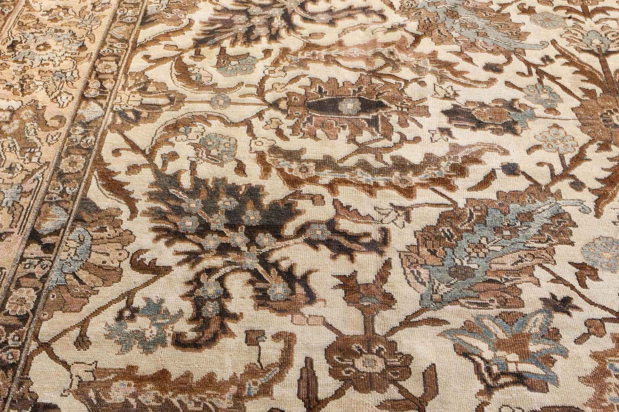 Authentique tapis en laine Tabriz 1900 ivoire, bleu et marron fait à la main
Taille : 342 × 436 cm (11'3