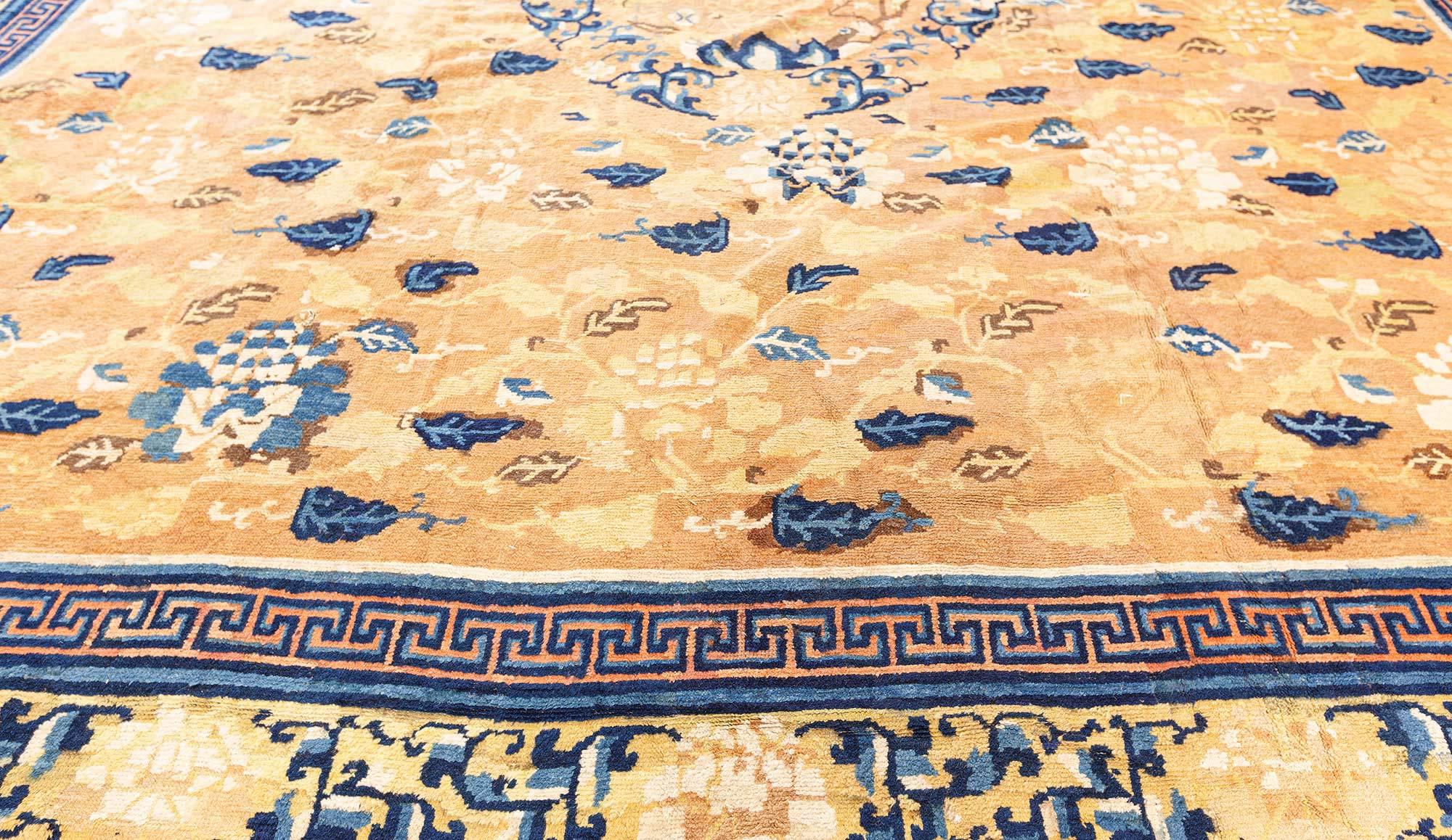 Authentic 19th century Chinese yellow, blue handmade wool rug
Size: 13'4