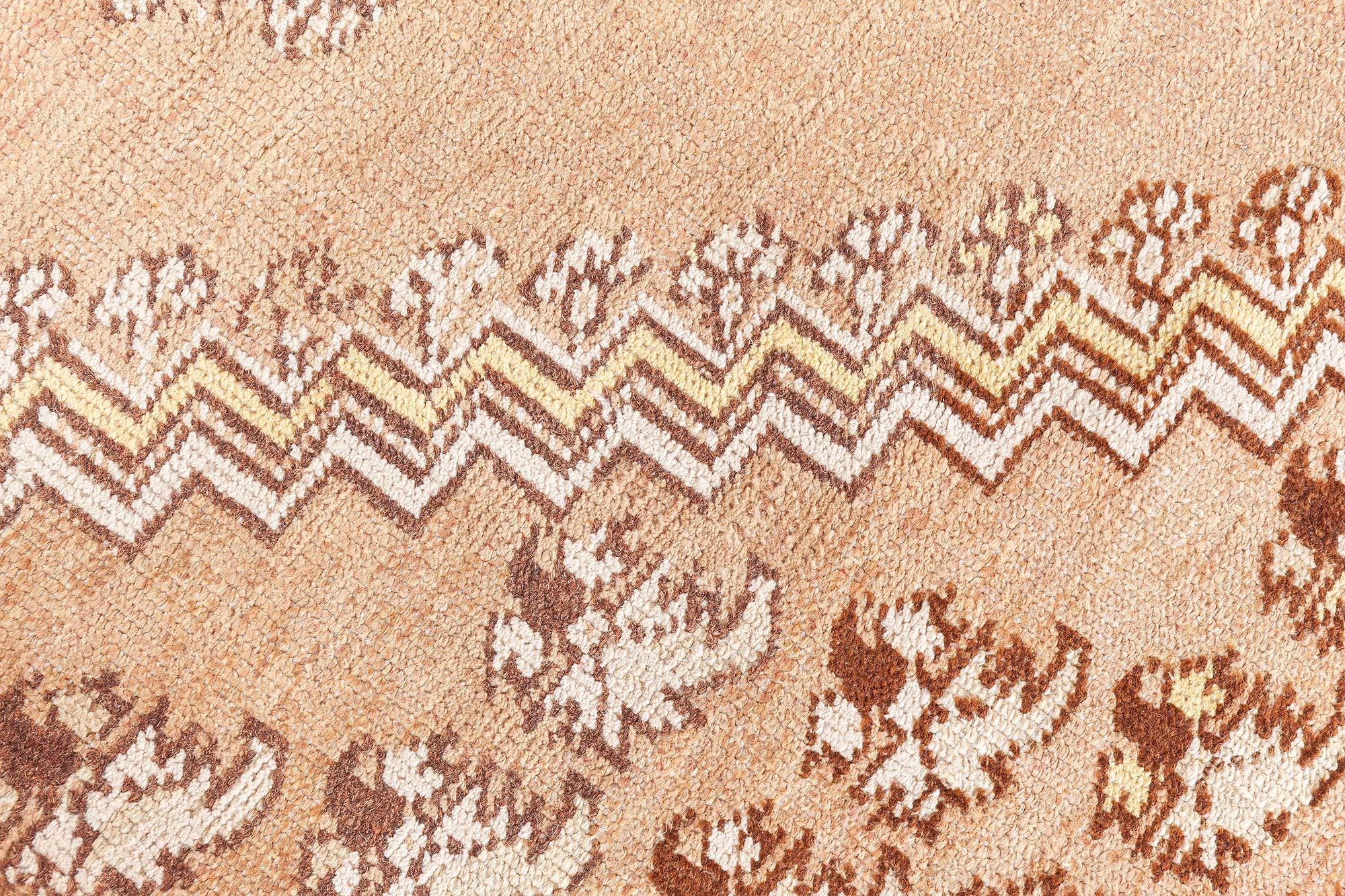 19th century Turkish Ghiordes light brown handwoven wool rug
Size: 11'1