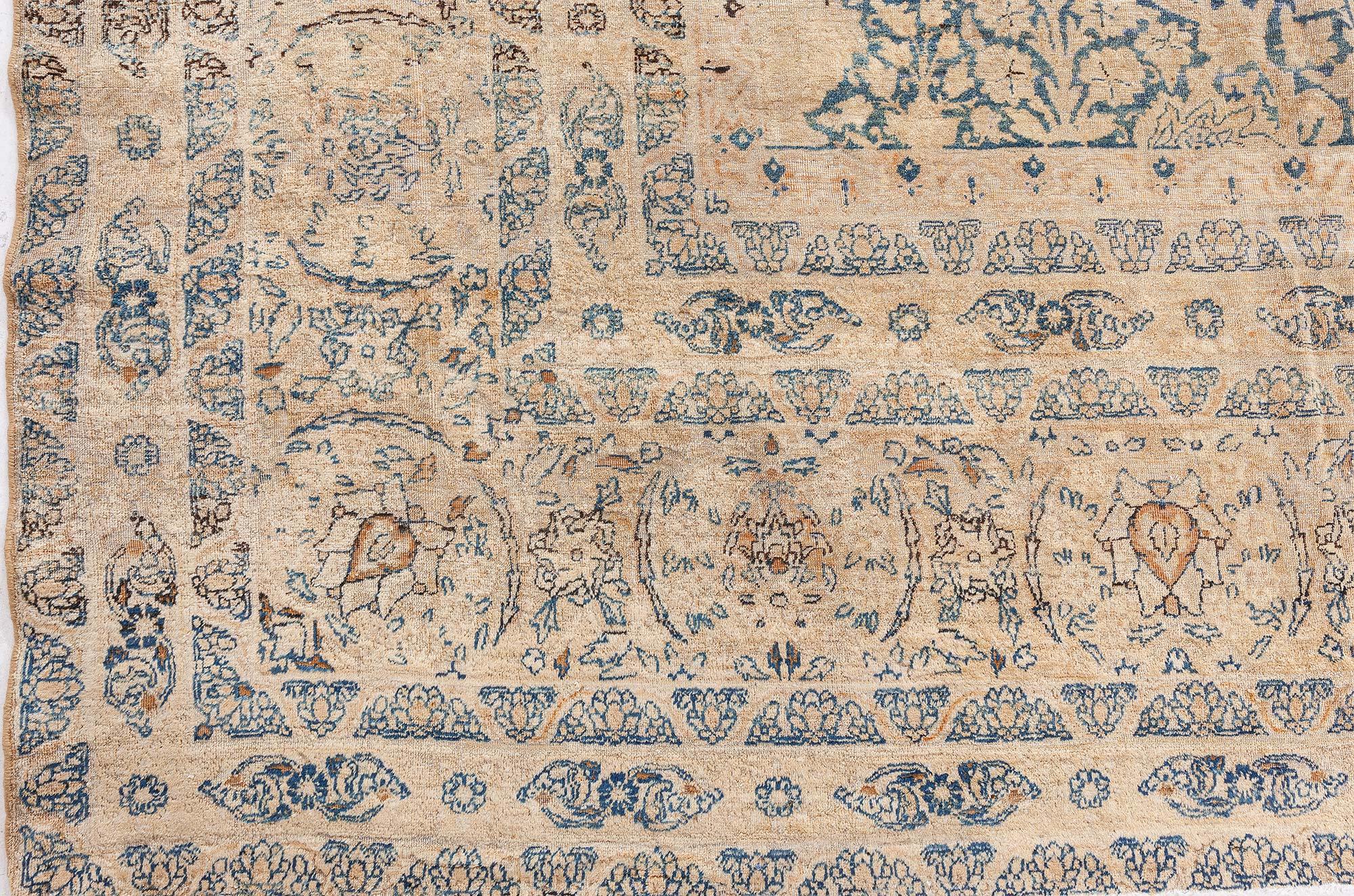 Ancien tapis persan Kirman en laine tissée à la main, bleu et beige
Taille : 11'4