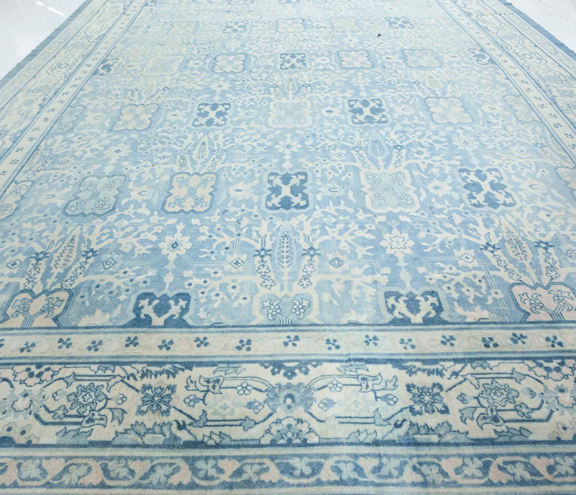 Antique Chinese Blue Wool Rug
Size: 14'2