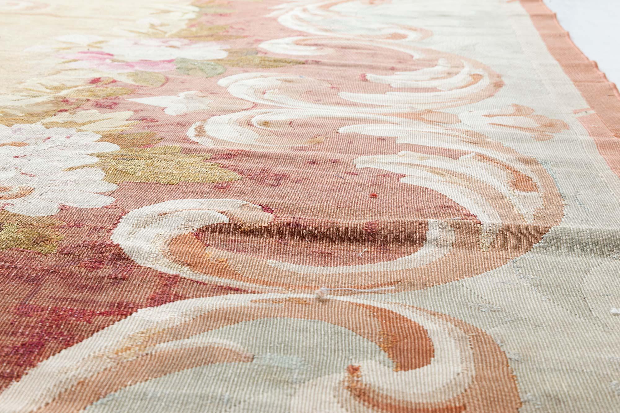 Antique French Aubusson floral handwoven wool rug
Size: 11'2